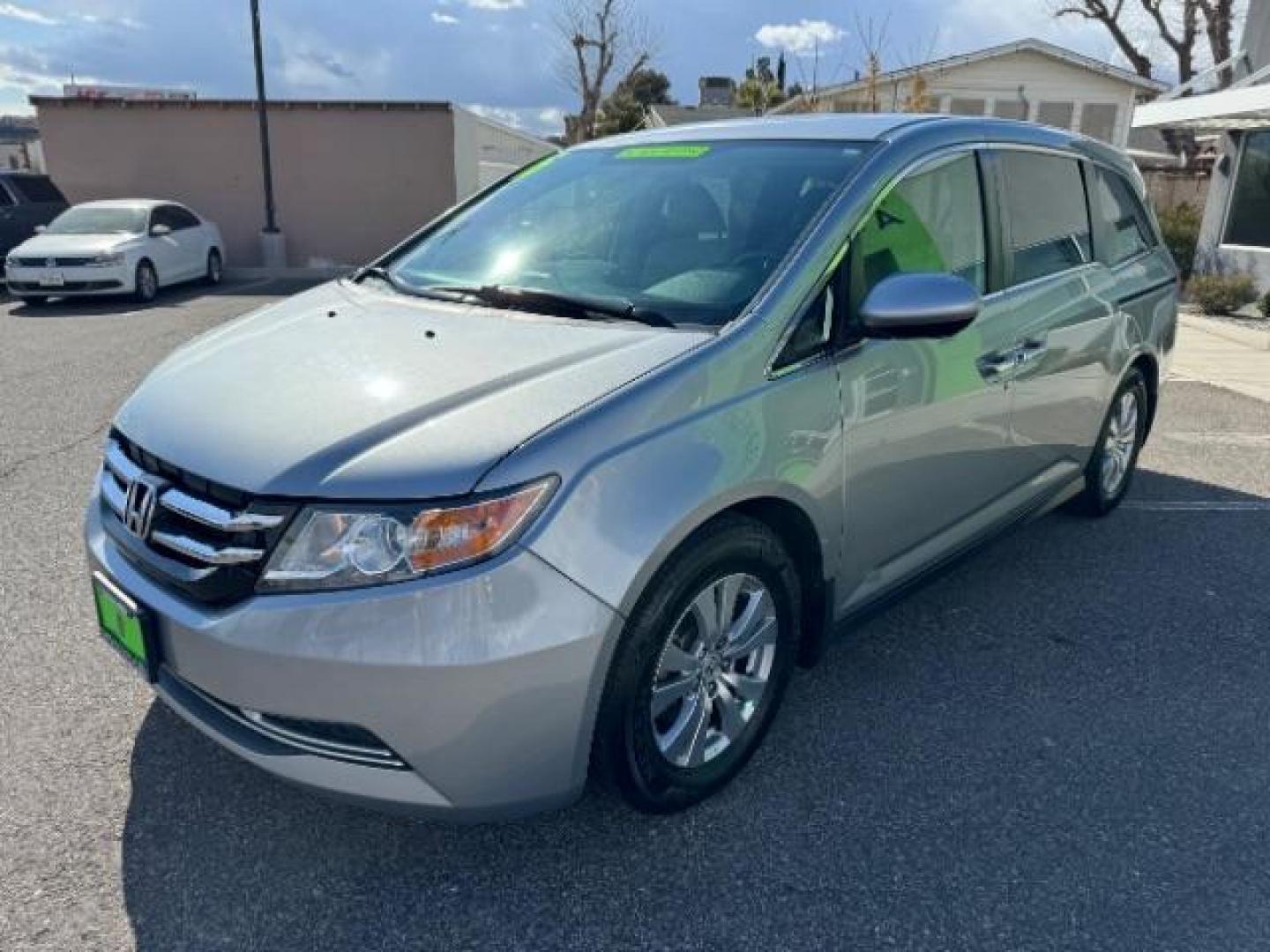 2016 Lunar Silver Metallic /Gray, cloth Honda Odyssey SE (5FNRL5H30GB) with an 3.5L V6 SOHC 24V engine, 6-Speed Automatic transmission, located at 940 North Main Street, Cedar City, UT, 84720, (435) 628-0023, 37.692936, -113.061897 - Photo#3