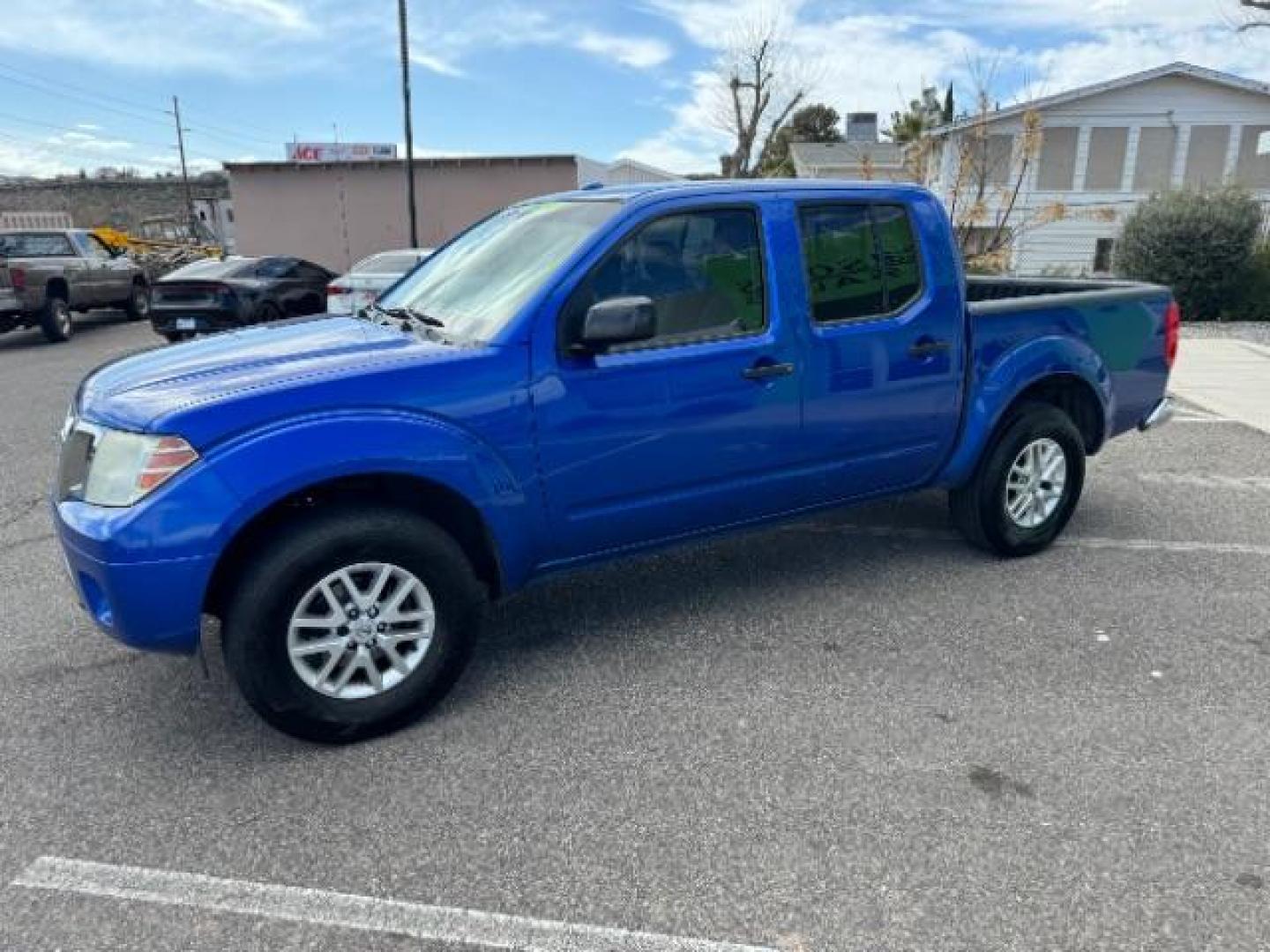 2014 Blue /Steel Nissan Frontier S Crew Cab 5AT 2WD (1N6AD0ER3EN) with an 4.0L V6 DOHC 24V engine, 5-Speed Automatic transmission, located at 940 North Main Street, Cedar City, UT, 84720, (435) 628-0023, 37.692936, -113.061897 - Photo#4