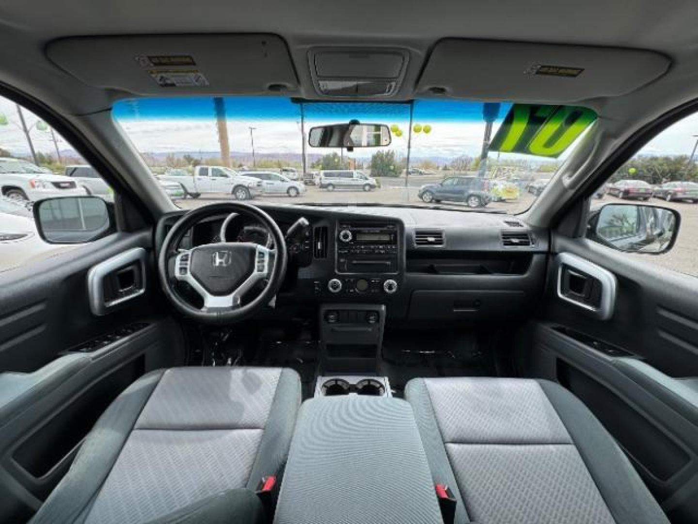 2007 Formal Black /Gray Cloth Interior Honda Ridgeline RTS (2HJYK16477H) with an 3.5L V6 SOHC 24V engine, 5-Speed Automatic transmission, located at 940 North Main Street, Cedar City, UT, 84720, (435) 628-0023, 37.692936, -113.061897 - We specialize in helping ALL people get the best financing available. No matter your credit score, good, bad or none we can get you an amazing rate. Had a bankruptcy, divorce, or repossessions? We give you the green light to get your credit back on the road. Low down and affordable payments that fit - Photo#26