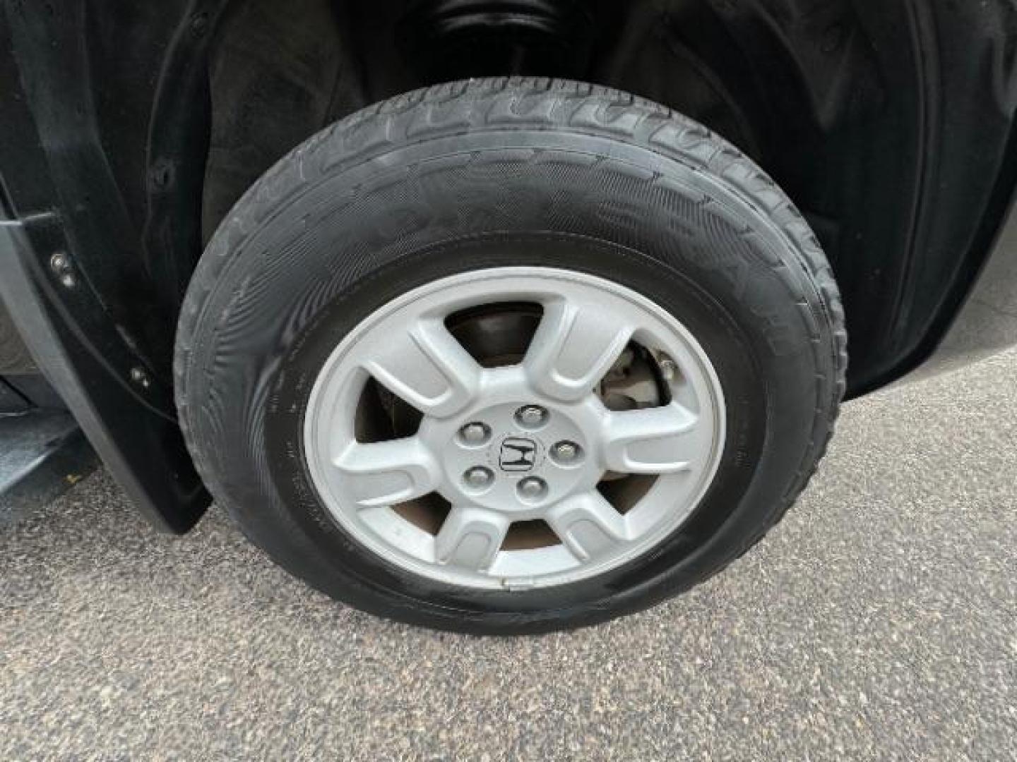 2007 Formal Black /Gray Cloth Interior Honda Ridgeline RTS (2HJYK16477H) with an 3.5L V6 SOHC 24V engine, 5-Speed Automatic transmission, located at 940 North Main Street, Cedar City, UT, 84720, (435) 628-0023, 37.692936, -113.061897 - We specialize in helping ALL people get the best financing available. No matter your credit score, good, bad or none we can get you an amazing rate. Had a bankruptcy, divorce, or repossessions? We give you the green light to get your credit back on the road. Low down and affordable payments that fit - Photo#11