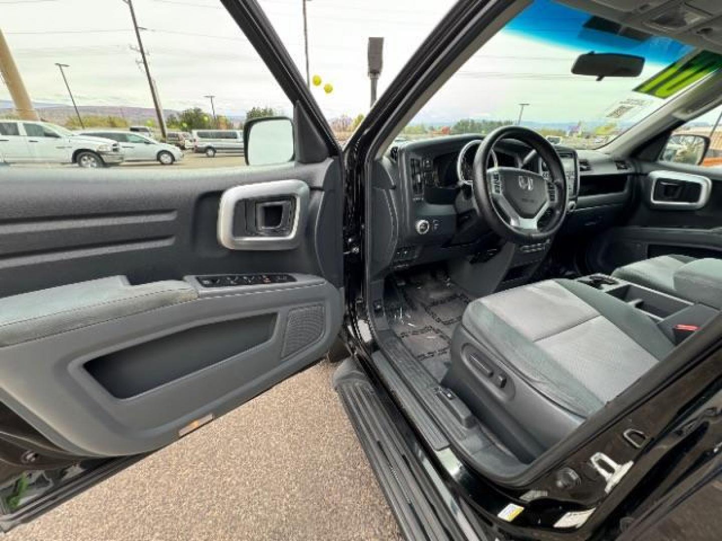 2007 Formal Black /Gray Cloth Interior Honda Ridgeline RTS (2HJYK16477H) with an 3.5L V6 SOHC 24V engine, 5-Speed Automatic transmission, located at 940 North Main Street, Cedar City, UT, 84720, (435) 628-0023, 37.692936, -113.061897 - We specialize in helping ALL people get the best financing available. No matter your credit score, good, bad or none we can get you an amazing rate. Had a bankruptcy, divorce, or repossessions? We give you the green light to get your credit back on the road. Low down and affordable payments that fit - Photo#14