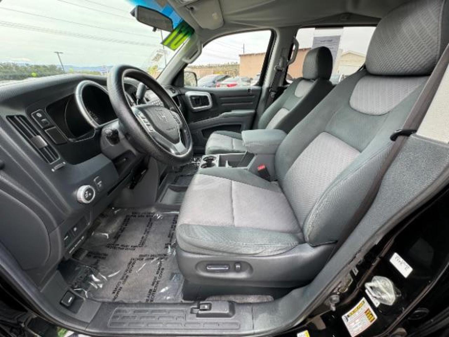 2007 Formal Black /Gray Cloth Interior Honda Ridgeline RTS (2HJYK16477H) with an 3.5L V6 SOHC 24V engine, 5-Speed Automatic transmission, located at 940 North Main Street, Cedar City, UT, 84720, (435) 628-0023, 37.692936, -113.061897 - We specialize in helping ALL people get the best financing available. No matter your credit score, good, bad or none we can get you an amazing rate. Had a bankruptcy, divorce, or repossessions? We give you the green light to get your credit back on the road. Low down and affordable payments that fit - Photo#16