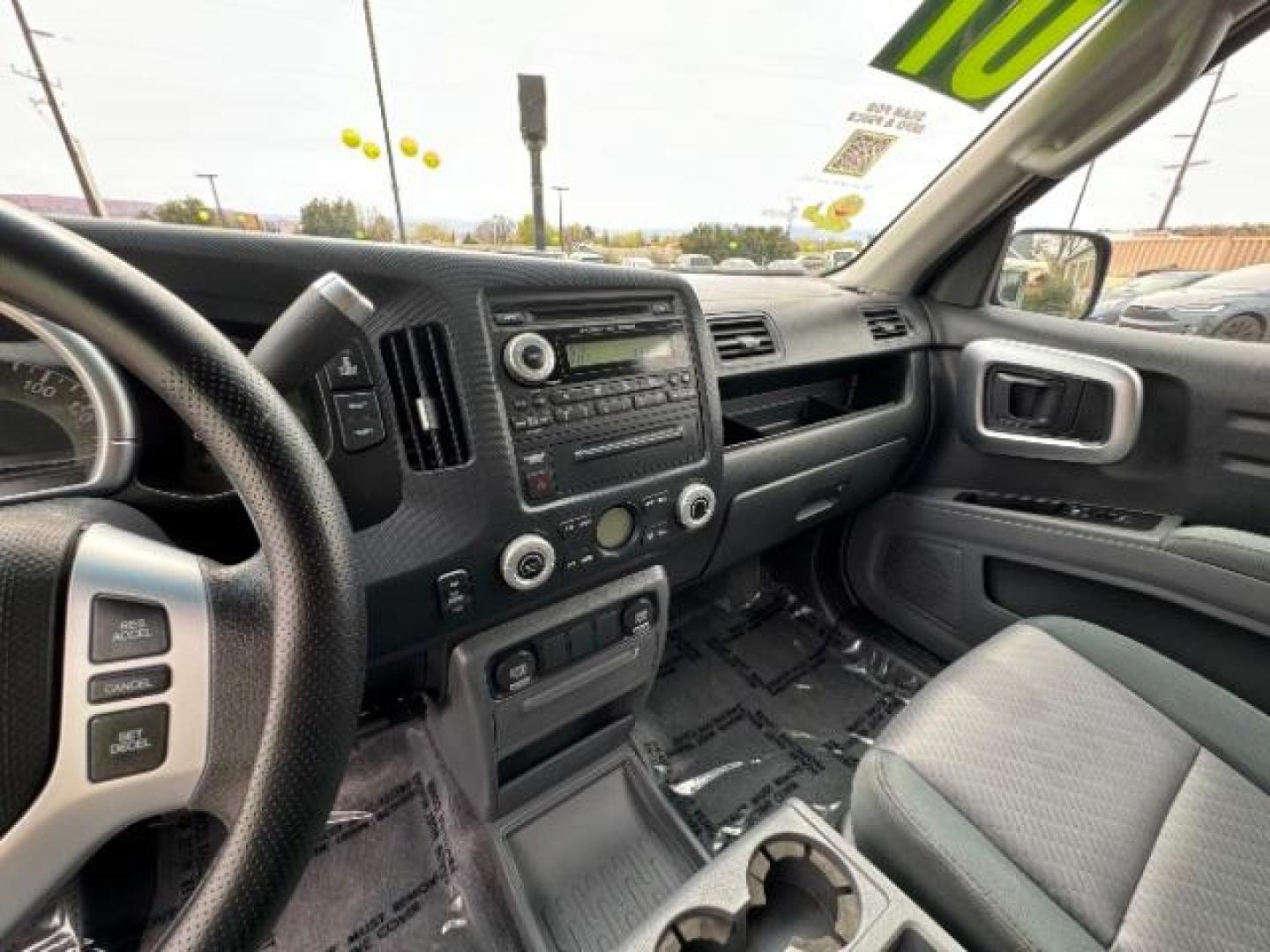 2007 Formal Black /Gray Cloth Interior Honda Ridgeline RTS (2HJYK16477H) with an 3.5L V6 SOHC 24V engine, 5-Speed Automatic transmission, located at 940 North Main Street, Cedar City, UT, 84720, (435) 628-0023, 37.692936, -113.061897 - We specialize in helping ALL people get the best financing available. No matter your credit score, good, bad or none we can get you an amazing rate. Had a bankruptcy, divorce, or repossessions? We give you the green light to get your credit back on the road. Low down and affordable payments that fit - Photo#17