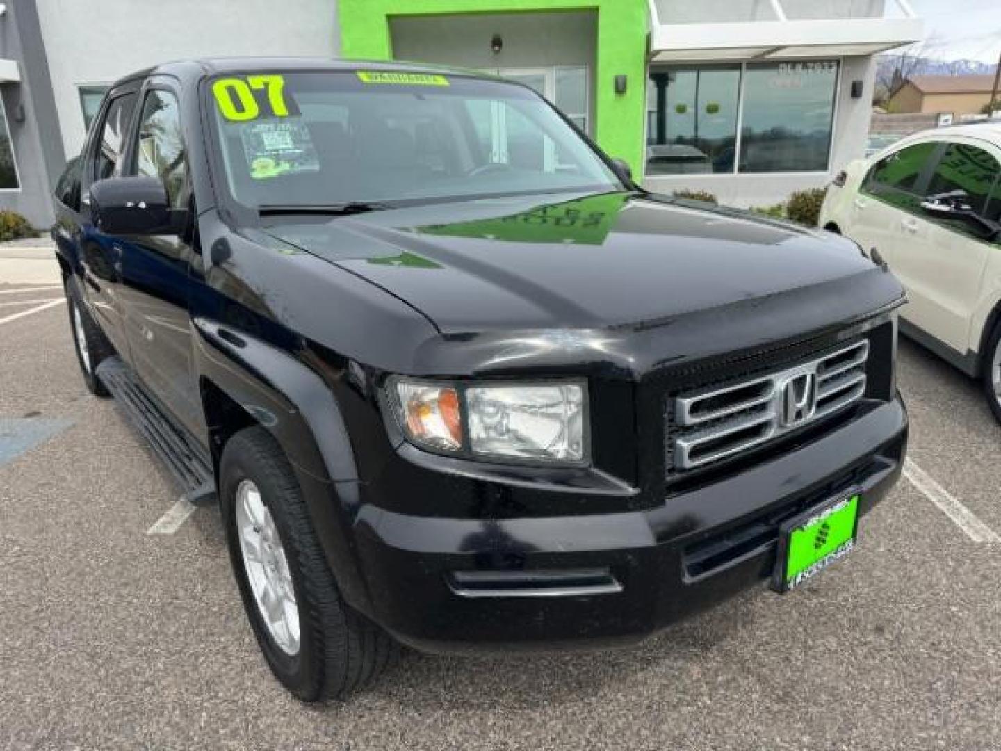 2007 Formal Black /Gray Cloth Interior Honda Ridgeline RTS (2HJYK16477H) with an 3.5L V6 SOHC 24V engine, 5-Speed Automatic transmission, located at 940 North Main Street, Cedar City, UT, 84720, (435) 628-0023, 37.692936, -113.061897 - We specialize in helping ALL people get the best financing available. No matter your credit score, good, bad or none we can get you an amazing rate. Had a bankruptcy, divorce, or repossessions? We give you the green light to get your credit back on the road. Low down and affordable payments that fit - Photo#1