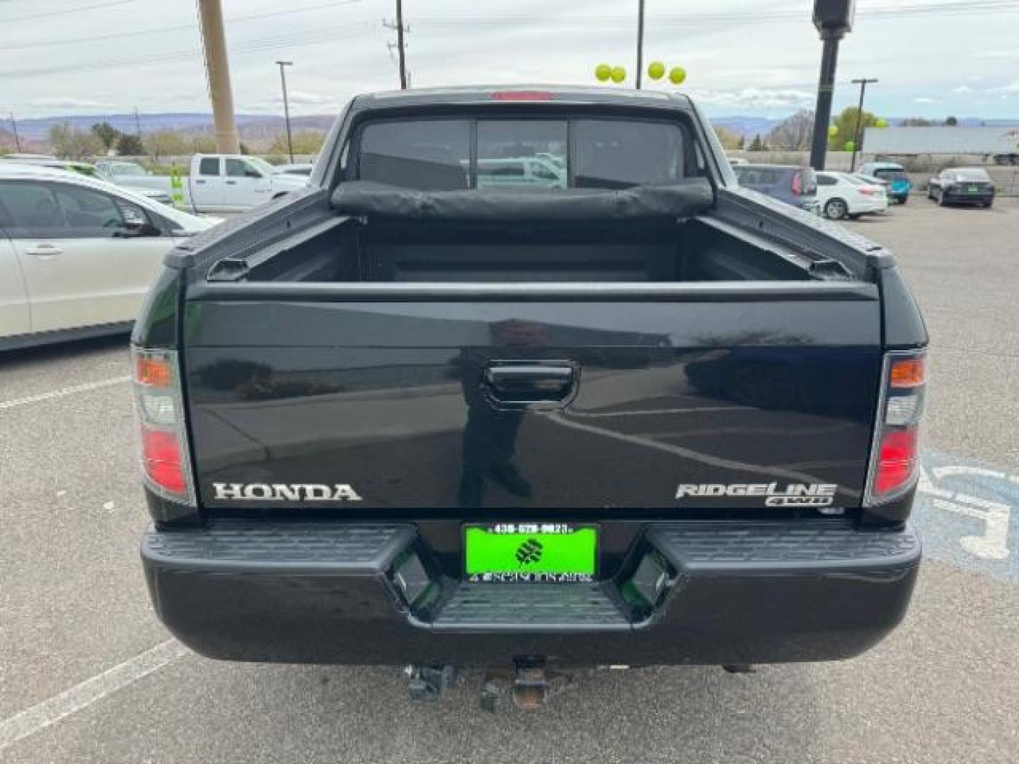 2007 Formal Black /Gray Cloth Interior Honda Ridgeline RTS (2HJYK16477H) with an 3.5L V6 SOHC 24V engine, 5-Speed Automatic transmission, located at 940 North Main Street, Cedar City, UT, 84720, (435) 628-0023, 37.692936, -113.061897 - We specialize in helping ALL people get the best financing available. No matter your credit score, good, bad or none we can get you an amazing rate. Had a bankruptcy, divorce, or repossessions? We give you the green light to get your credit back on the road. Low down and affordable payments that fit - Photo#7