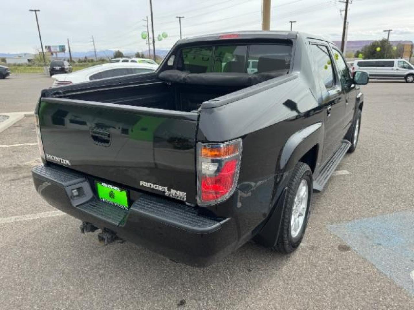 2007 Formal Black /Gray Cloth Interior Honda Ridgeline RTS (2HJYK16477H) with an 3.5L V6 SOHC 24V engine, 5-Speed Automatic transmission, located at 940 North Main Street, Cedar City, UT, 84720, (435) 628-0023, 37.692936, -113.061897 - We specialize in helping ALL people get the best financing available. No matter your credit score, good, bad or none we can get you an amazing rate. Had a bankruptcy, divorce, or repossessions? We give you the green light to get your credit back on the road. Low down and affordable payments that fit - Photo#8