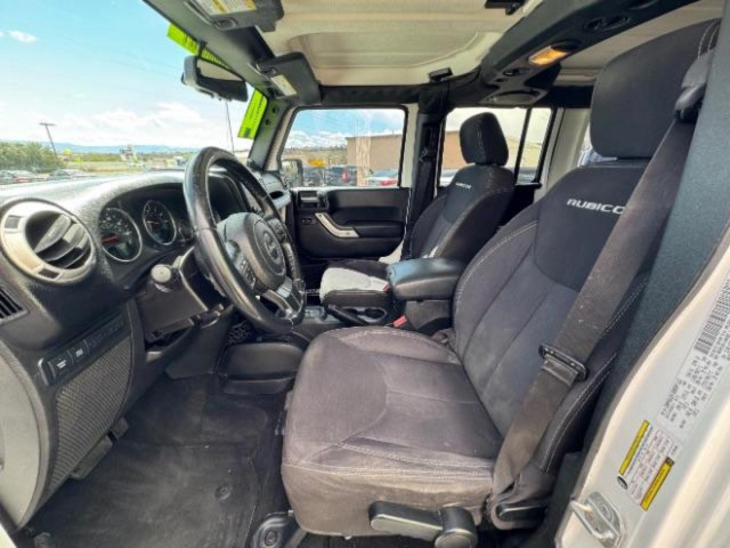 2014 Bright White Clearcoat /Black Jeep Wrangler Unlimited Rubicon 4WD (1C4BJWFG3EL) with an 3.6L V6 DOHC 24V FFV engine, 5-Speed Automatic transmission, located at 1865 East Red Hills Pkwy, St. George, 84770, (435) 628-0023, 37.120850, -113.543640 - Photo#18