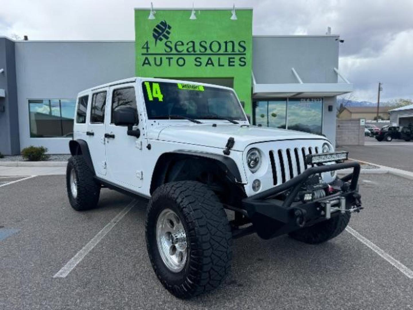 2014 Bright White Clearcoat /Black Jeep Wrangler Unlimited Rubicon 4WD (1C4BJWFG3EL) with an 3.6L V6 DOHC 24V FFV engine, 5-Speed Automatic transmission, located at 1865 East Red Hills Pkwy, St. George, 84770, (435) 628-0023, 37.120850, -113.543640 - Photo#0