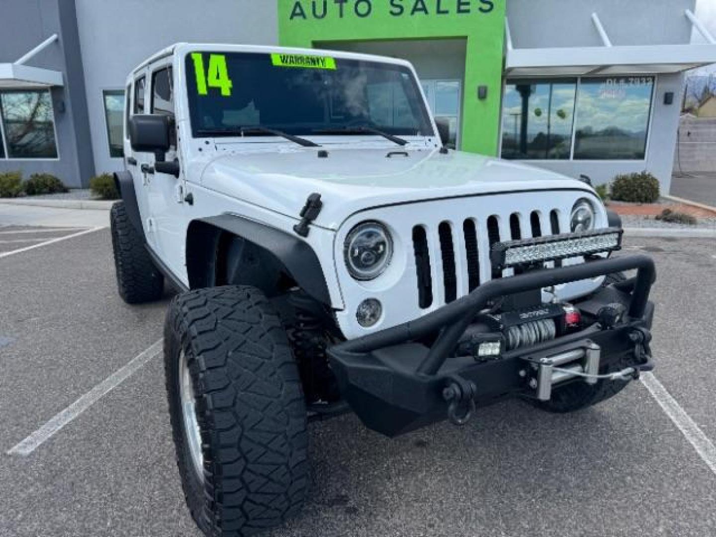 2014 Bright White Clearcoat /Black Jeep Wrangler Unlimited Rubicon 4WD (1C4BJWFG3EL) with an 3.6L V6 DOHC 24V FFV engine, 5-Speed Automatic transmission, located at 1865 East Red Hills Pkwy, St. George, 84770, (435) 628-0023, 37.120850, -113.543640 - Photo#1