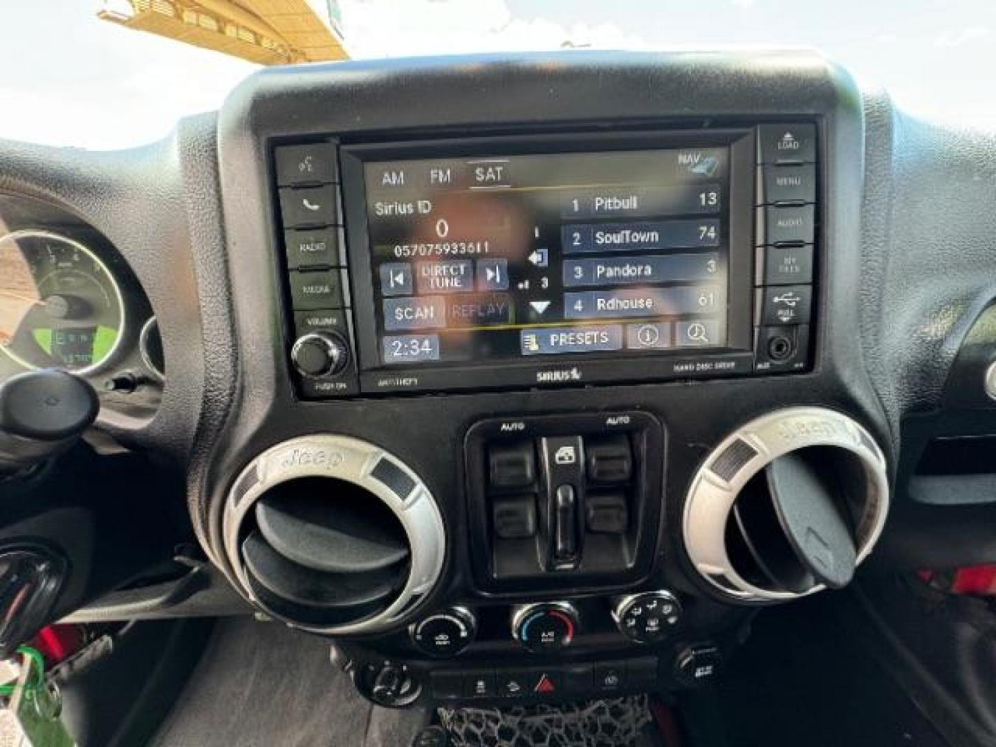 2014 Bright White Clearcoat /Black Jeep Wrangler Unlimited Rubicon 4WD (1C4BJWFG3EL) with an 3.6L V6 DOHC 24V FFV engine, 5-Speed Automatic transmission, located at 1865 East Red Hills Pkwy, St. George, 84770, (435) 628-0023, 37.120850, -113.543640 - Photo#23