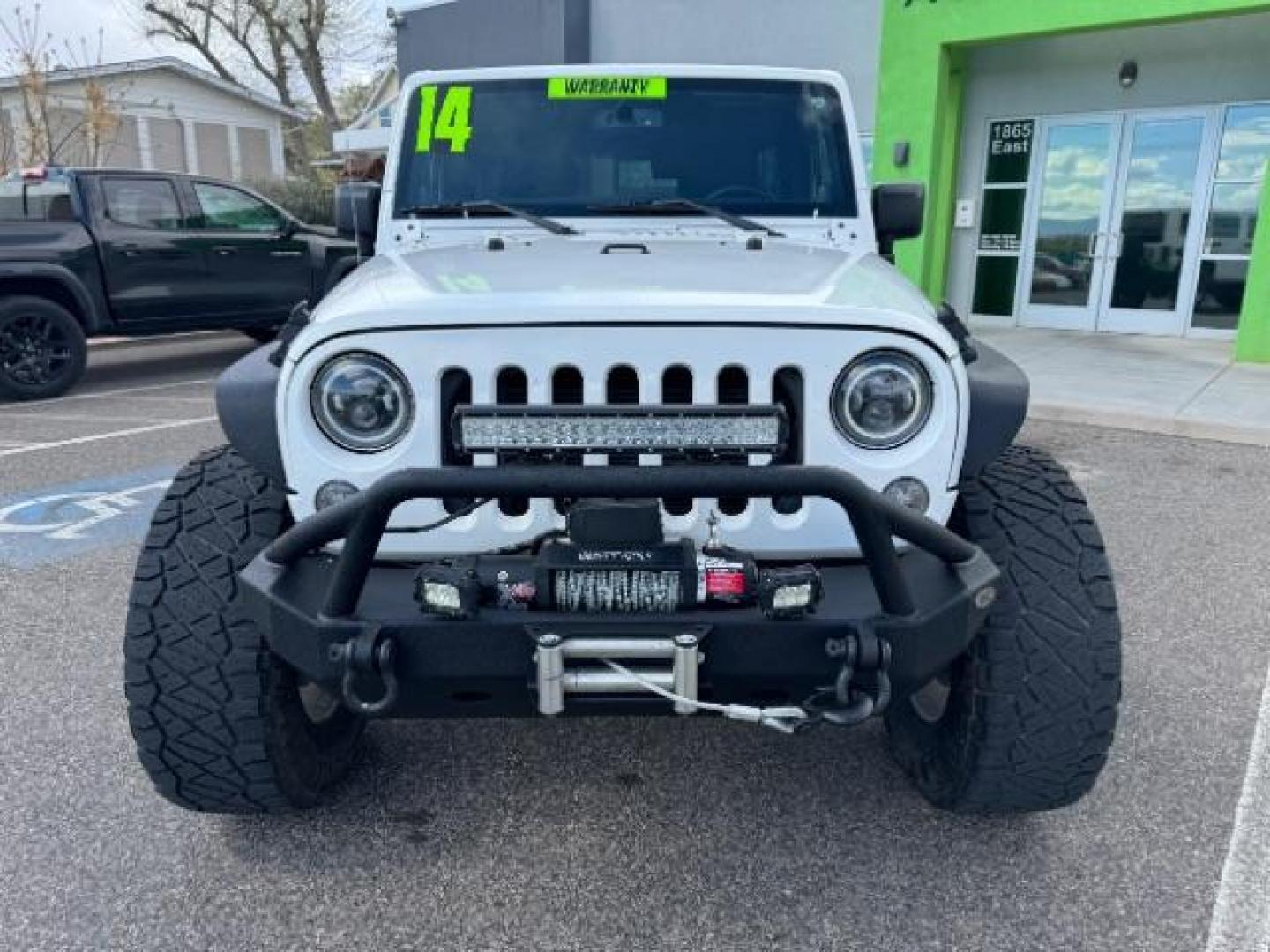 2014 Bright White Clearcoat /Black Jeep Wrangler Unlimited Rubicon 4WD (1C4BJWFG3EL) with an 3.6L V6 DOHC 24V FFV engine, 5-Speed Automatic transmission, located at 1865 East Red Hills Pkwy, St. George, 84770, (435) 628-0023, 37.120850, -113.543640 - Photo#2