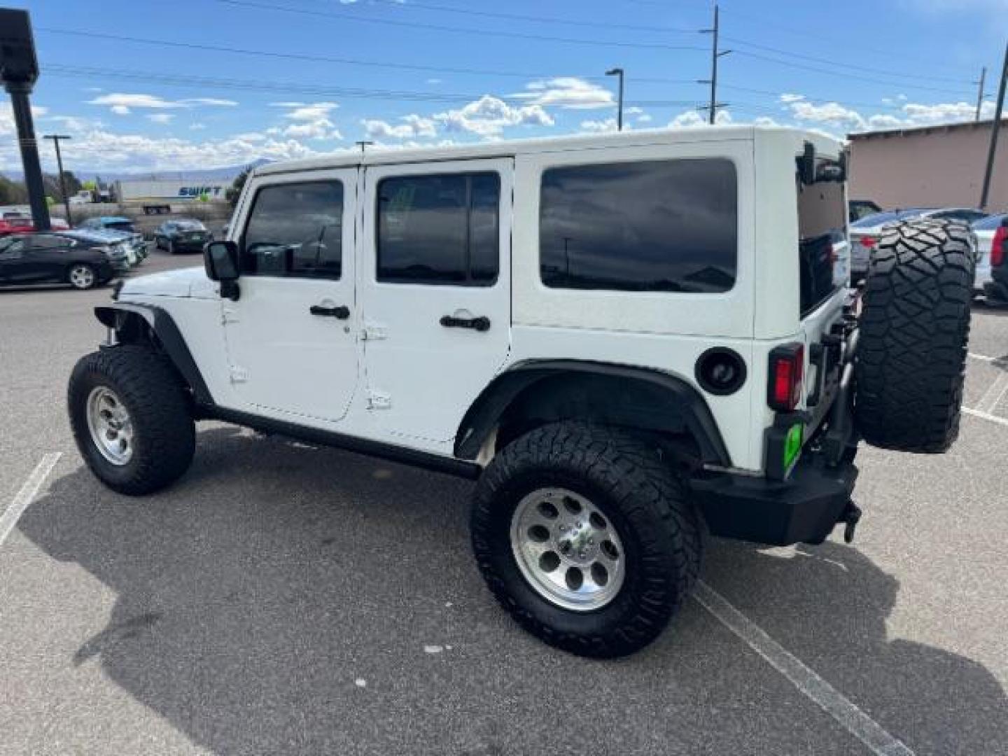 2014 Bright White Clearcoat /Black Jeep Wrangler Unlimited Rubicon 4WD (1C4BJWFG3EL) with an 3.6L V6 DOHC 24V FFV engine, 5-Speed Automatic transmission, located at 1865 East Red Hills Pkwy, St. George, 84770, (435) 628-0023, 37.120850, -113.543640 - Photo#6