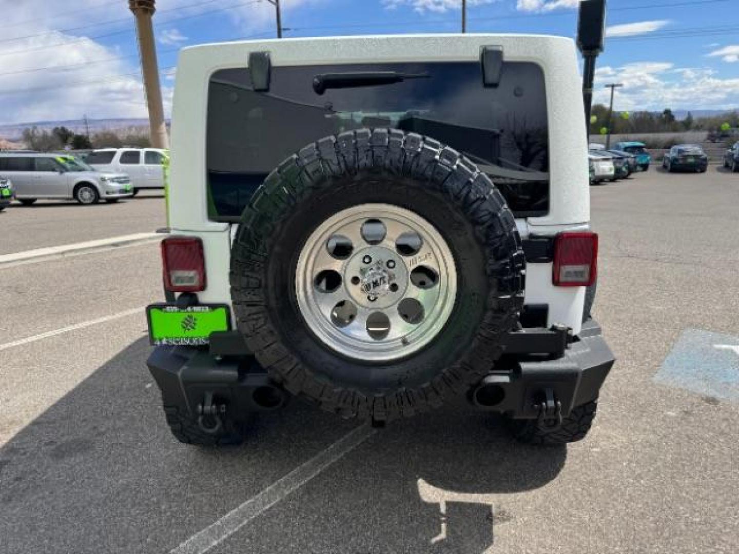 2014 Bright White Clearcoat /Black Jeep Wrangler Unlimited Rubicon 4WD (1C4BJWFG3EL) with an 3.6L V6 DOHC 24V FFV engine, 5-Speed Automatic transmission, located at 1865 East Red Hills Pkwy, St. George, 84770, (435) 628-0023, 37.120850, -113.543640 - Photo#8