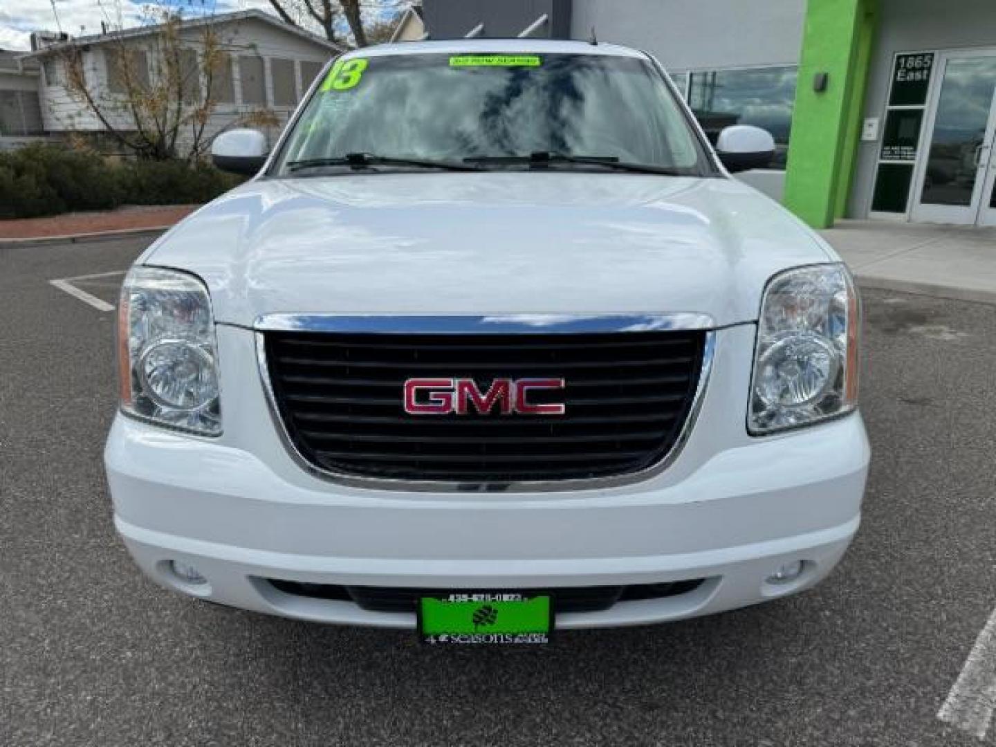 2013 Summit White /Light Tan Leather Interior GMC Yukon SLT 4WD (1GKS2CE09DR) with an 5.3L V8 OHV 16V FFV engine, 6-Speed Automatic transmission, located at 1865 East Red Hills Pkwy, St. George, 84770, (435) 628-0023, 37.120850, -113.543640 - Photo#2