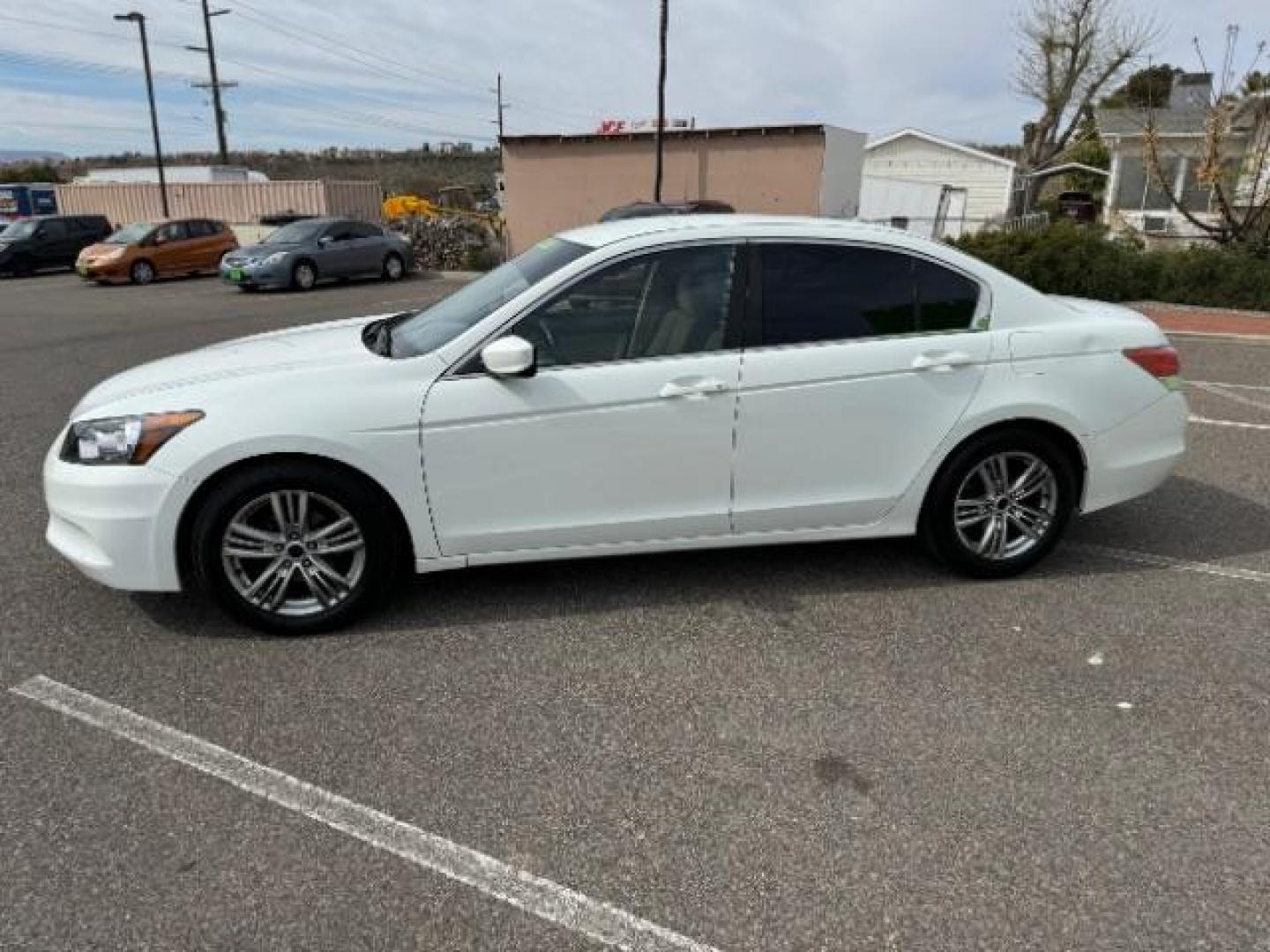 2011 Taffeta White /Ivory Cloth Interior Honda Accord LX Sedan AT (1HGCP2F30BA) with an 2.4L L4 DOHC 16V engine, 5-Speed Automatic transmission, located at 940 North Main Street, Cedar City, UT, 84720, (435) 628-0023, 37.692936, -113.061897 - Photo#5