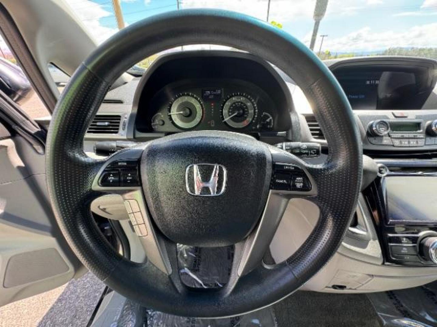 2015 Alabaster Silver Metallic Honda Odyssey EX (5FNRL5H46FB) with an 3.5L V6 SOHC 24V engine, 6-Speed Automatic transmission, located at 940 North Main Street, Cedar City, UT, 84720, (435) 628-0023, 37.692936, -113.061897 - We specialize in helping ALL people get the best financing available. No matter your credit score, good, bad or none we can get you an amazing rate. Had a bankruptcy, divorce, or repossessions? We give you the green light to get your credit back on the road. Low down and affordable payments that fit - Photo#21