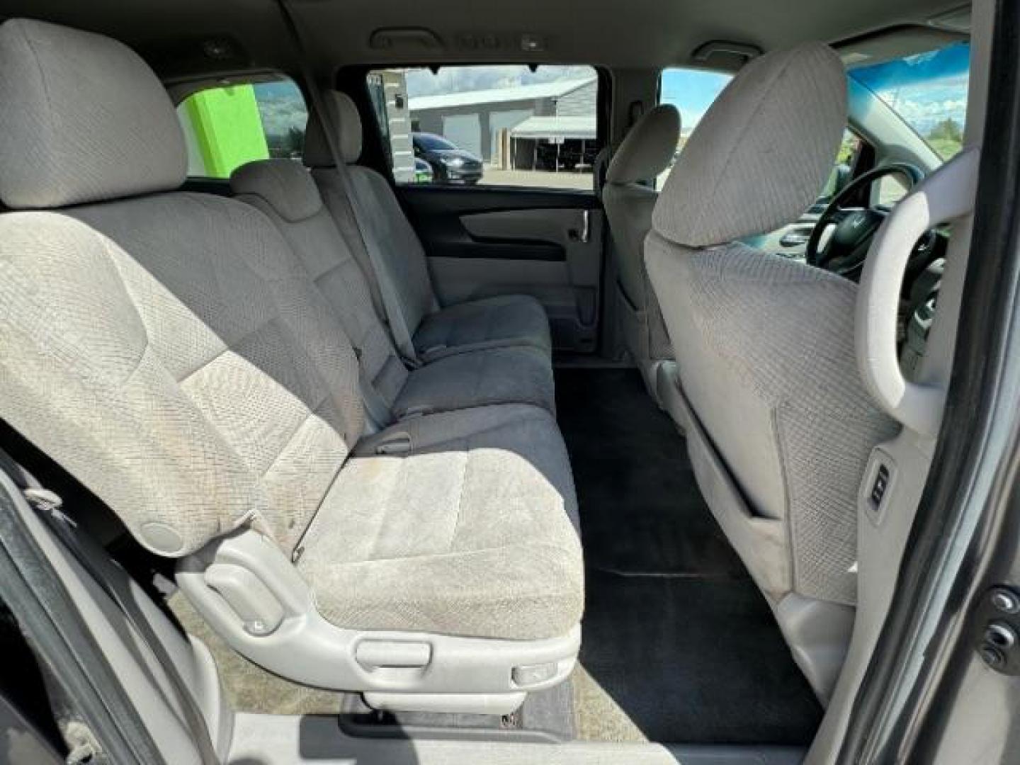 2015 Alabaster Silver Metallic Honda Odyssey EX (5FNRL5H46FB) with an 3.5L V6 SOHC 24V engine, 6-Speed Automatic transmission, located at 940 North Main Street, Cedar City, UT, 84720, (435) 628-0023, 37.692936, -113.061897 - Photo#37