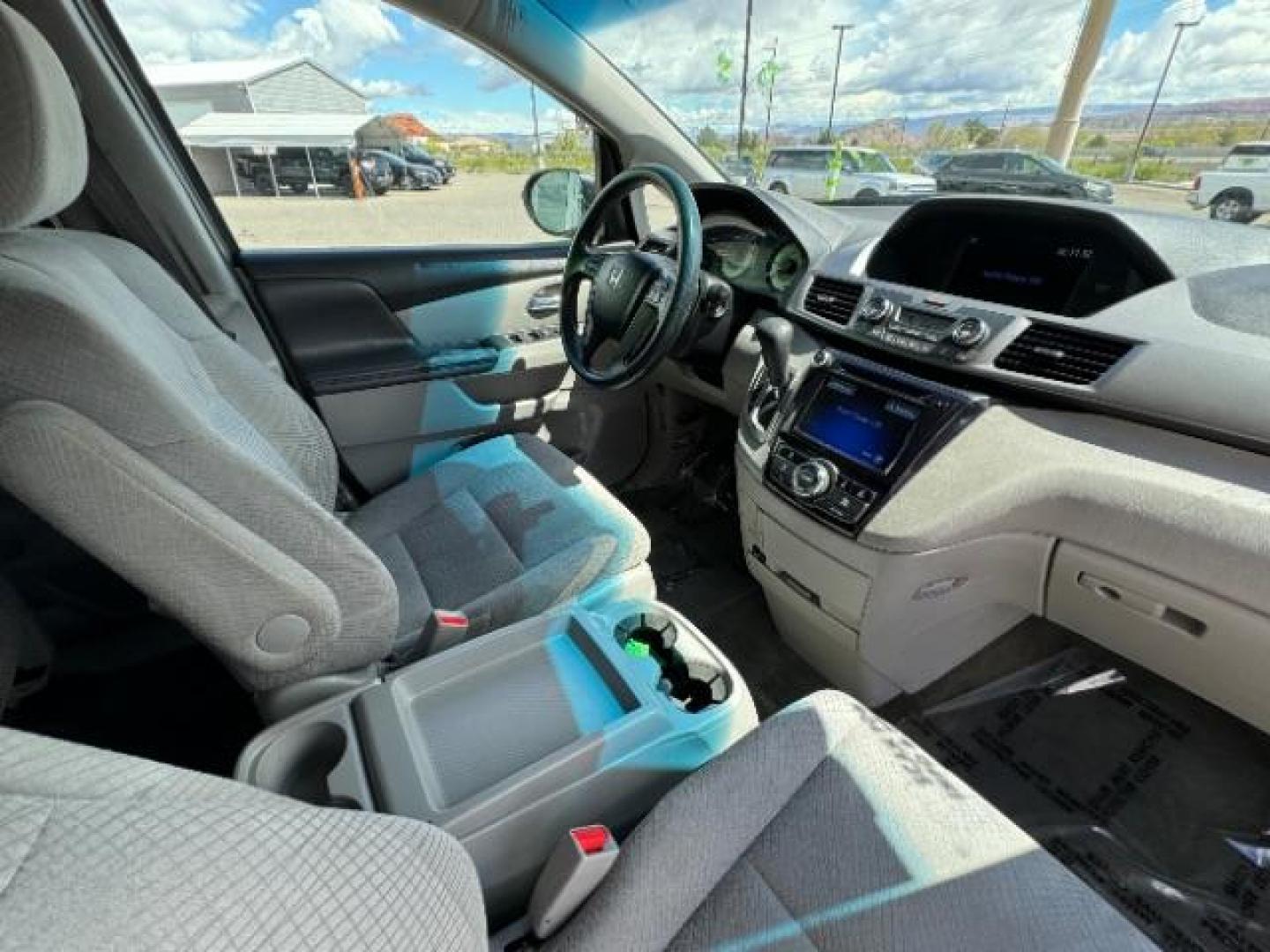 2015 Alabaster Silver Metallic Honda Odyssey EX (5FNRL5H46FB) with an 3.5L V6 SOHC 24V engine, 6-Speed Automatic transmission, located at 940 North Main Street, Cedar City, UT, 84720, (435) 628-0023, 37.692936, -113.061897 - Photo#39