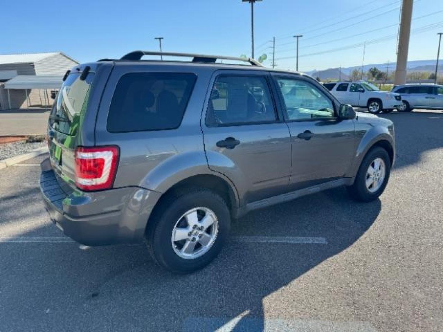 2011 Sterling Grey Metallic /Camel Cloth Interior Ford Escape XLT FWD (1FMCU0D7XBK) with an 2.5L L4 DOHC 16V engine, 6-Speed Automatic transmission, located at 1865 East Red Hills Pkwy, St. George, 84770, (435) 628-0023, 37.120850, -113.543640 - Photo#10