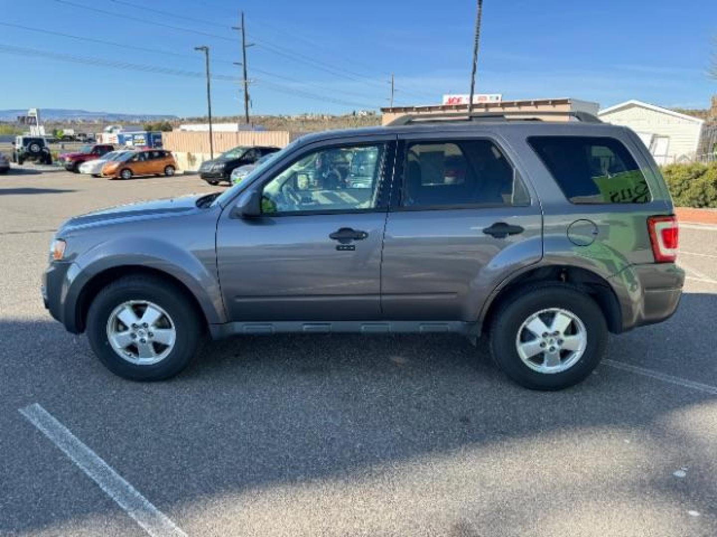 2011 Sterling Grey Metallic /Camel Cloth Interior Ford Escape XLT FWD (1FMCU0D7XBK) with an 2.5L L4 DOHC 16V engine, 6-Speed Automatic transmission, located at 1865 East Red Hills Pkwy, St. George, 84770, (435) 628-0023, 37.120850, -113.543640 - We specialize in helping ALL people get the best financing available. No matter your credit score, good, bad or none we can get you an amazing rate. Had a bankruptcy, divorce, or repossessions? We give you the green light to get your credit back on the road. Low down and affordable payments that fit - Photo#5