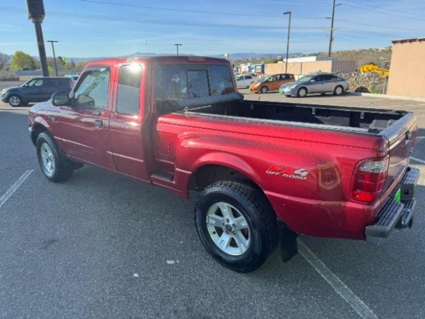 2003 MAROON /Dark Graphite Cloth Interior Ford Ranger XLT SuperCab 4WD - 389A (1FTZR45E53P) with an 4.0L V6 SOHC 12V engine, located at 940 North Main Street, Cedar City, UT, 84720, (435) 628-0023, 37.692936, -113.061897 - We specialize in helping ALL people get the best financing available. No matter your credit score, good, bad or none we can get you an amazing rate. Had a bankruptcy, divorce, or repossessions? We give you the green light to get your credit back on the road. Low down and affordable payments that fit - Photo#7