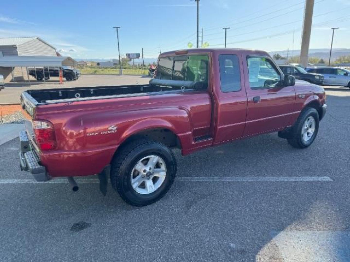 2003 MAROON /Dark Graphite Cloth Interior Ford Ranger XLT SuperCab 4WD - 389A (1FTZR45E53P) with an 4.0L V6 SOHC 12V engine, located at 940 North Main Street, Cedar City, UT, 84720, (435) 628-0023, 37.692936, -113.061897 - We specialize in helping ALL people get the best financing available. No matter your credit score, good, bad or none we can get you an amazing rate. Had a bankruptcy, divorce, or repossessions? We give you the green light to get your credit back on the road. Low down and affordable payments that fit - Photo#11