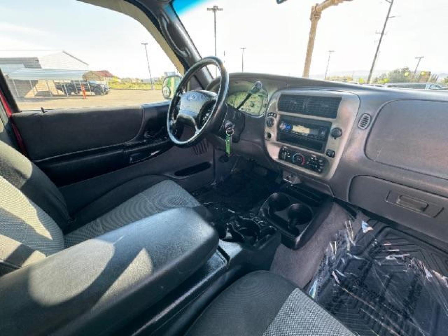 2003 MAROON /Dark Graphite Cloth Interior Ford Ranger XLT SuperCab 4WD - 389A (1FTZR45E53P) with an 4.0L V6 SOHC 12V engine, located at 940 North Main Street, Cedar City, UT, 84720, (435) 628-0023, 37.692936, -113.061897 - We specialize in helping ALL people get the best financing available. No matter your credit score, good, bad or none we can get you an amazing rate. Had a bankruptcy, divorce, or repossessions? We give you the green light to get your credit back on the road. Low down and affordable payments that fit - Photo#26