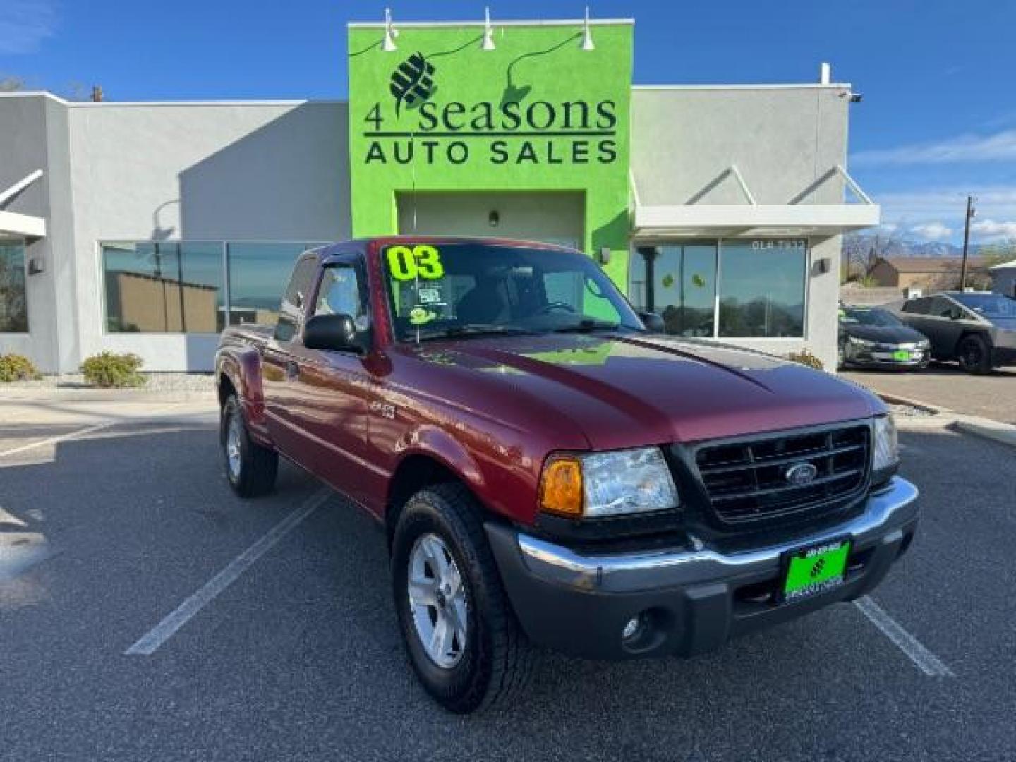 2003 MAROON /Dark Graphite Cloth Interior Ford Ranger XLT SuperCab 4WD - 389A (1FTZR45E53P) with an 4.0L V6 SOHC 12V engine, located at 940 North Main Street, Cedar City, UT, 84720, (435) 628-0023, 37.692936, -113.061897 - Photo#0