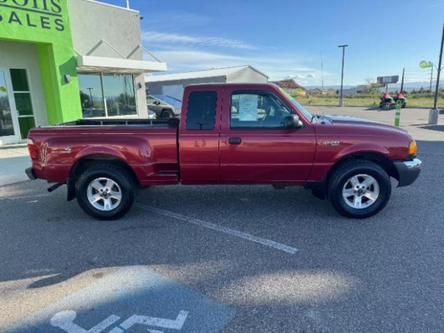 2003 MAROON /Dark Graphite Cloth Interior Ford Ranger XLT SuperCab 4WD - 389A (1FTZR45E53P) with an 4.0L V6 SOHC 12V engine, located at 940 North Main Street, Cedar City, UT, 84720, (435) 628-0023, 37.692936, -113.061897 - Photo#12