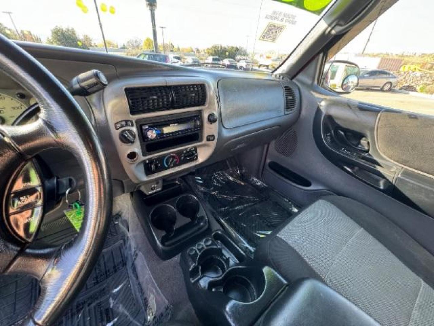 2003 MAROON /Dark Graphite Cloth Interior Ford Ranger XLT SuperCab 4WD - 389A (1FTZR45E53P) with an 4.0L V6 SOHC 12V engine, located at 940 North Main Street, Cedar City, UT, 84720, (435) 628-0023, 37.692936, -113.061897 - Photo#21