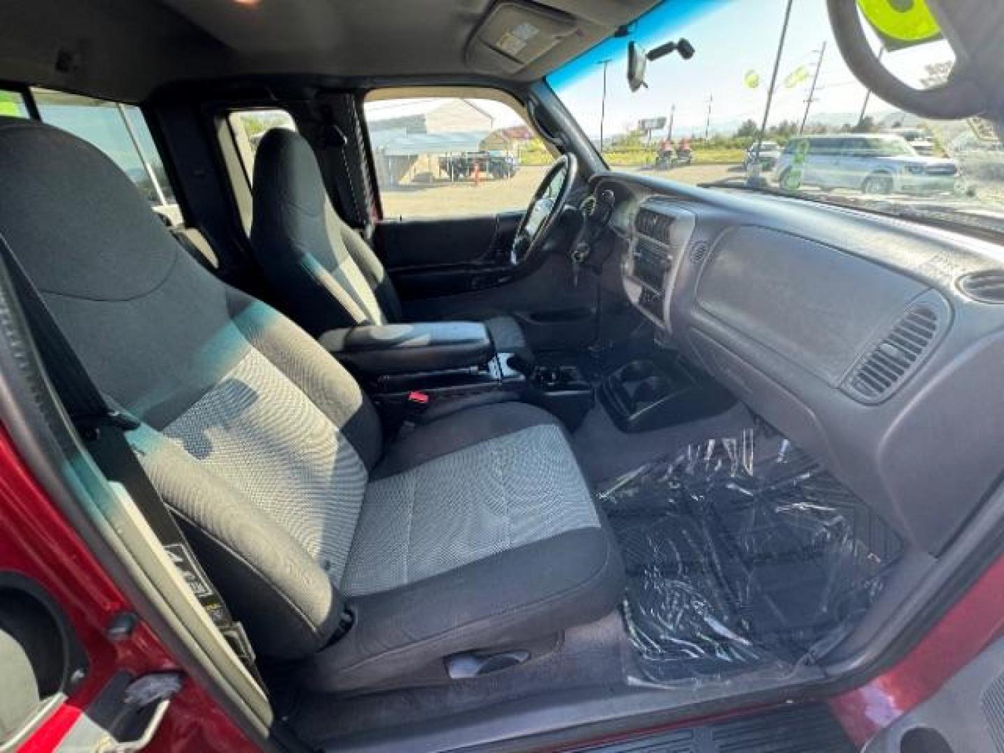 2003 MAROON /Dark Graphite Cloth Interior Ford Ranger XLT SuperCab 4WD - 389A (1FTZR45E53P) with an 4.0L V6 SOHC 12V engine, located at 940 North Main Street, Cedar City, UT, 84720, (435) 628-0023, 37.692936, -113.061897 - Photo#24