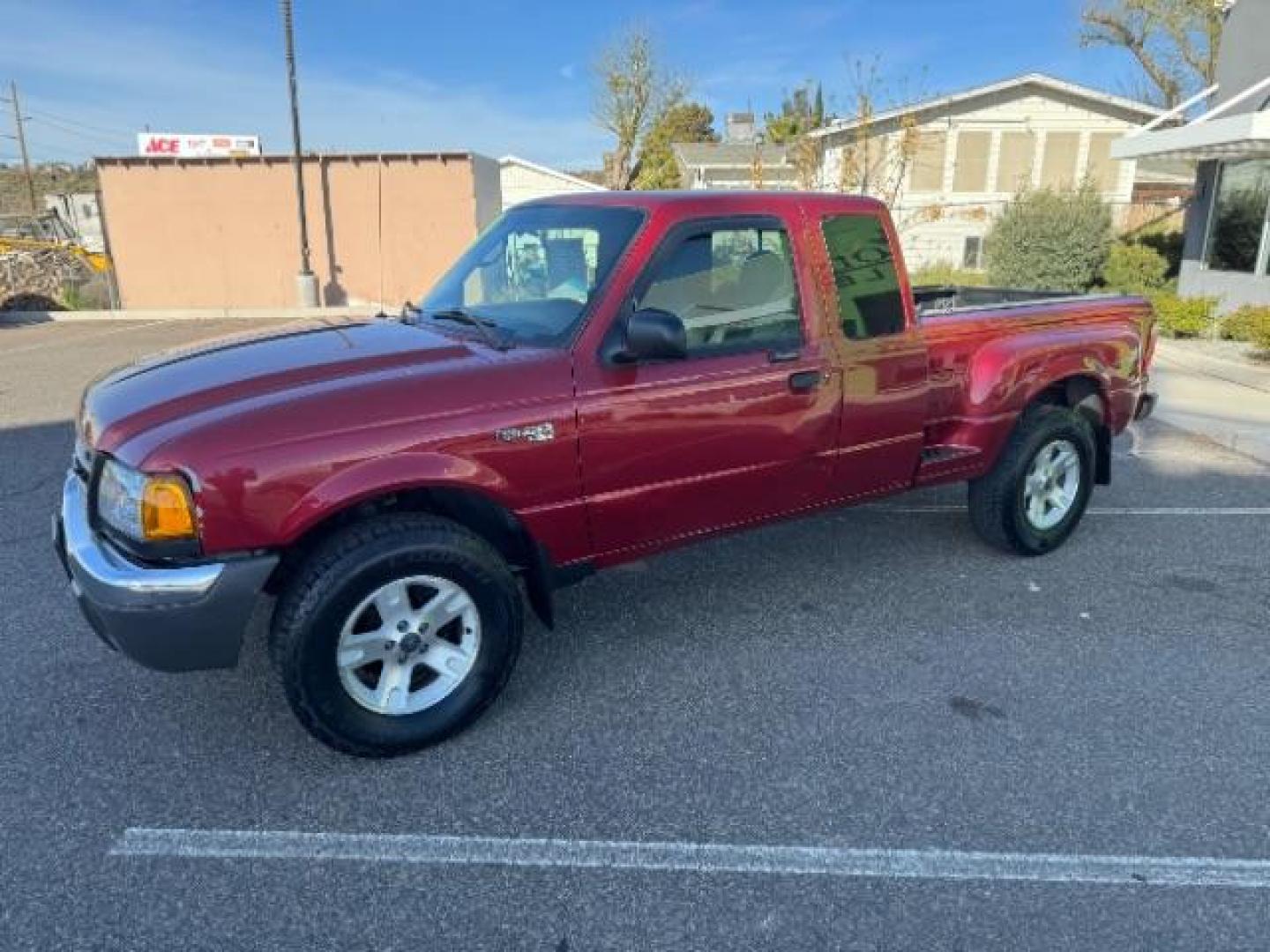 2003 MAROON /Dark Graphite Cloth Interior Ford Ranger XLT SuperCab 4WD - 389A (1FTZR45E53P) with an 4.0L V6 SOHC 12V engine, located at 940 North Main Street, Cedar City, UT, 84720, (435) 628-0023, 37.692936, -113.061897 - Photo#4