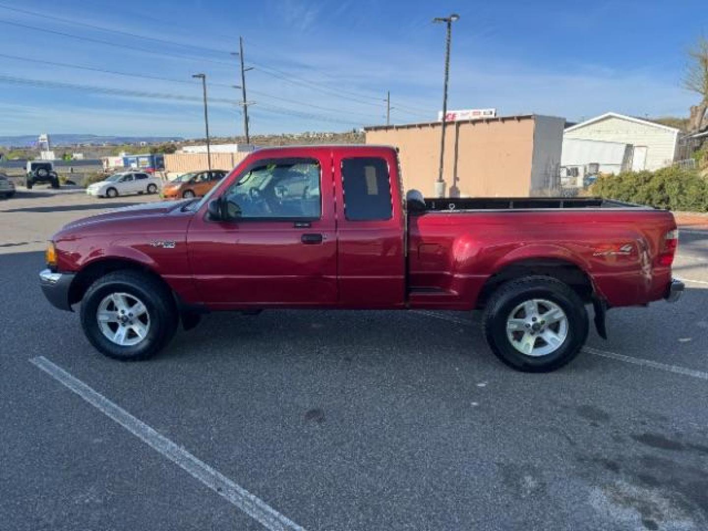 2003 MAROON /Dark Graphite Cloth Interior Ford Ranger XLT SuperCab 4WD - 389A (1FTZR45E53P) with an 4.0L V6 SOHC 12V engine, located at 940 North Main Street, Cedar City, UT, 84720, (435) 628-0023, 37.692936, -113.061897 - Photo#6