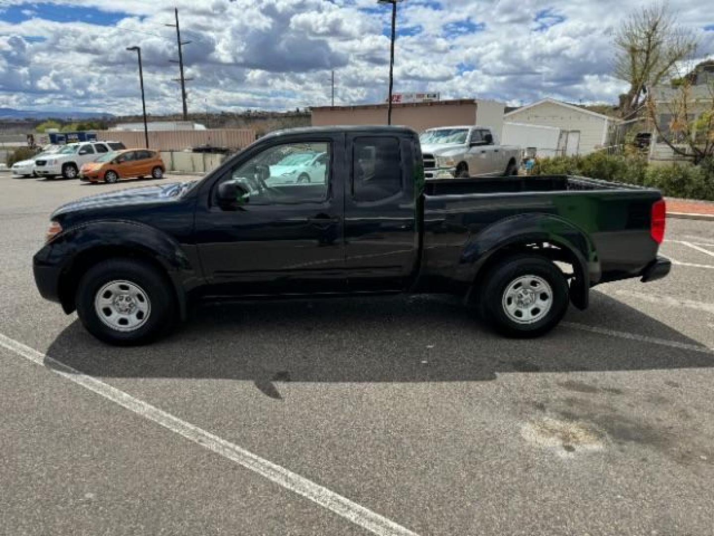 2019 Magnetic Black Pearl /Graphite, cloth Nissan Frontier SV King Cab I4 5MT 2WD (1N6BD0CT4KN) with an 2.5L L4 DOHC 16V engine, 5-Speed Manual transmission, located at 940 North Main Street, Cedar City, UT, 84720, (435) 628-0023, 37.692936, -113.061897 - We specialize in helping ALL people get the best financing available. No matter your credit score, good, bad or none we can get you an amazing rate. Had a bankruptcy, divorce, or repossessions? We give you the green light to get your credit back on the road. Low down and affordable payments that fit - Photo#5