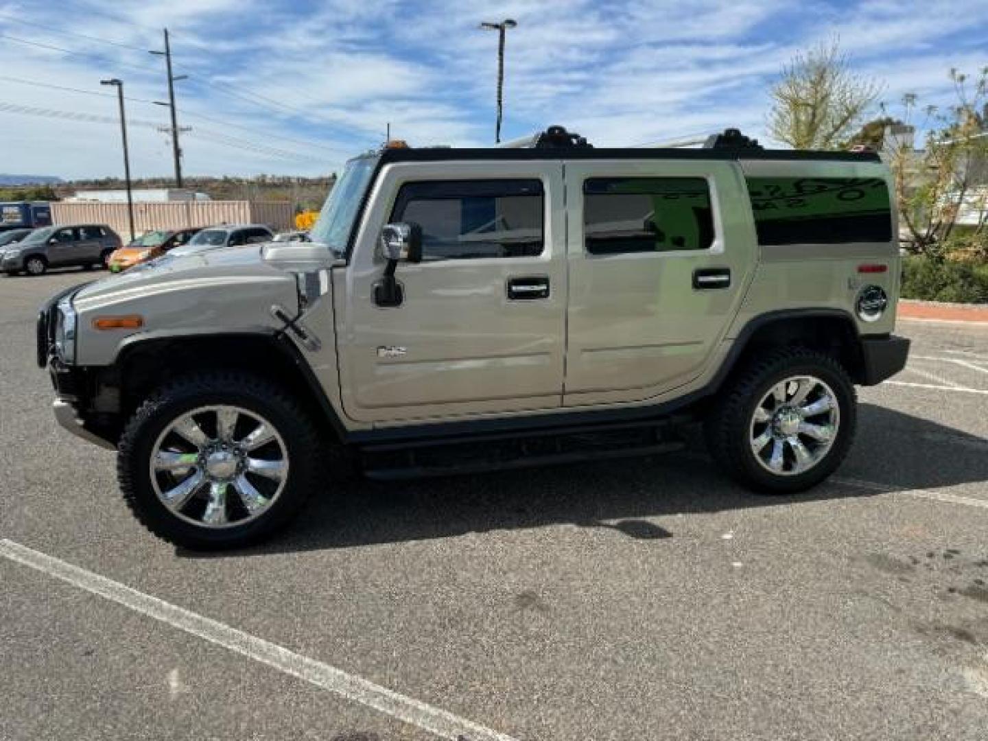 2003 Pewter Metallic /Wheat Leather Interior Hummer H2 Sport Utility (5GRGN23U73H) with an 6.0L V8 OHV 16V engine, 4-Speed Automatic transmission, located at 1865 East Red Hills Pkwy, St. George, 84770, (435) 628-0023, 37.120850, -113.543640 - We specialize in helping ALL people get the best financing available. No matter your credit score, good, bad or none we can get you an amazing rate. Had a bankruptcy, divorce, or repossessions? We give you the green light to get your credit back on the road. Low down and affordable payments that fit - Photo#5