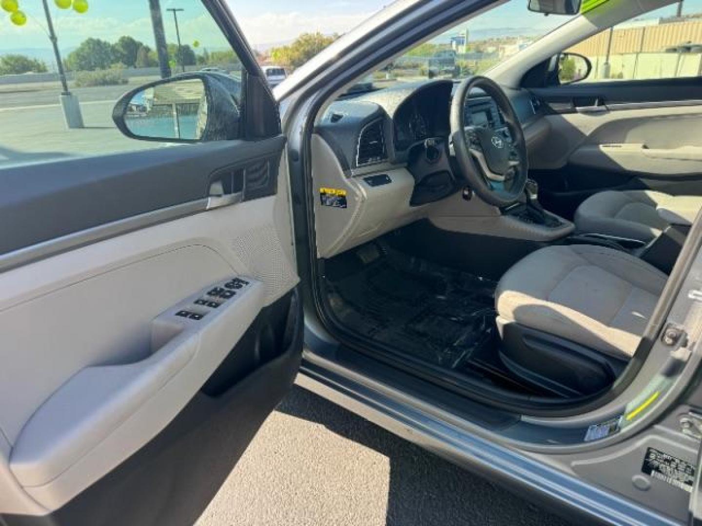 2018 Galactic Gray /Beige, cloth Hyundai Elantra SE 6AT (KMHD74LFXJU) with an 1.8L L4 DOHC 16V engine, 6-Speed Automatic transmission, located at 1865 East Red Hills Pkwy, St. George, 84770, (435) 628-0023, 37.120850, -113.543640 - Photo#12