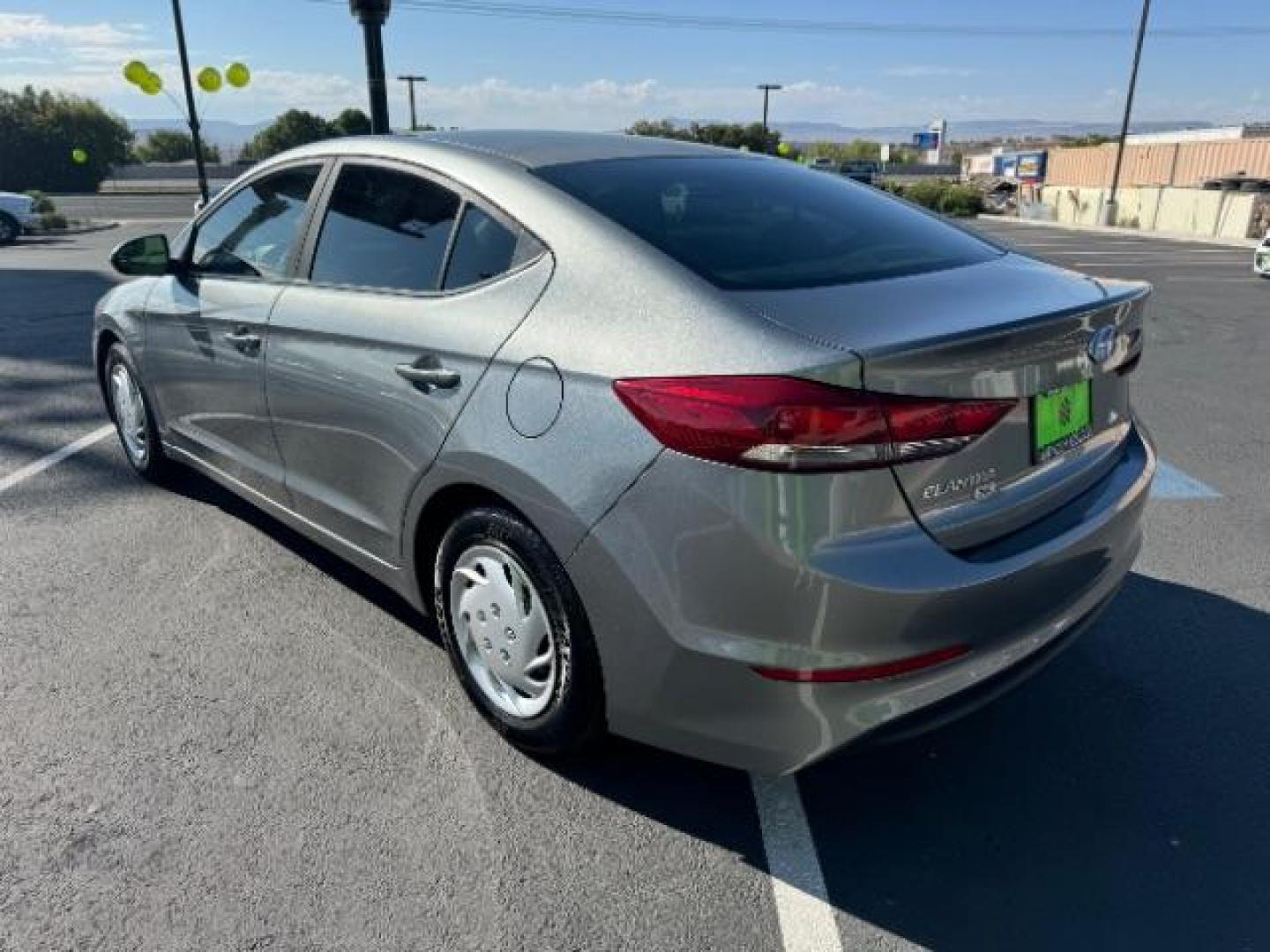 2018 Galactic Gray /Beige, cloth Hyundai Elantra SE 6AT (KMHD74LFXJU) with an 1.8L L4 DOHC 16V engine, 6-Speed Automatic transmission, located at 940 North Main Street, Cedar City, UT, 84720, (435) 628-0023, 37.692936, -113.061897 - Photo#4