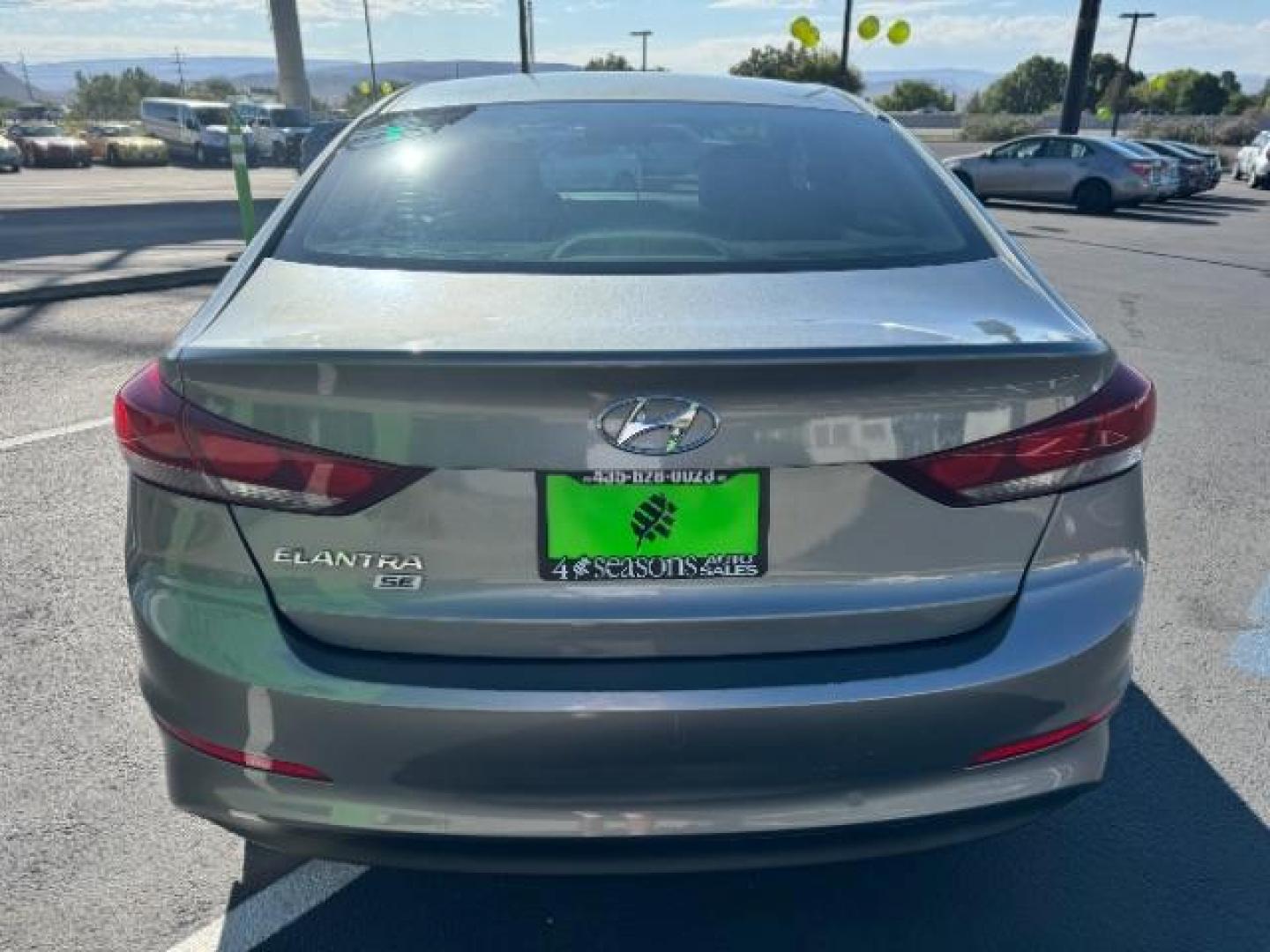 2018 Galactic Gray /Beige, cloth Hyundai Elantra SE 6AT (KMHD74LFXJU) with an 1.8L L4 DOHC 16V engine, 6-Speed Automatic transmission, located at 940 North Main Street, Cedar City, UT, 84720, (435) 628-0023, 37.692936, -113.061897 - Photo#5