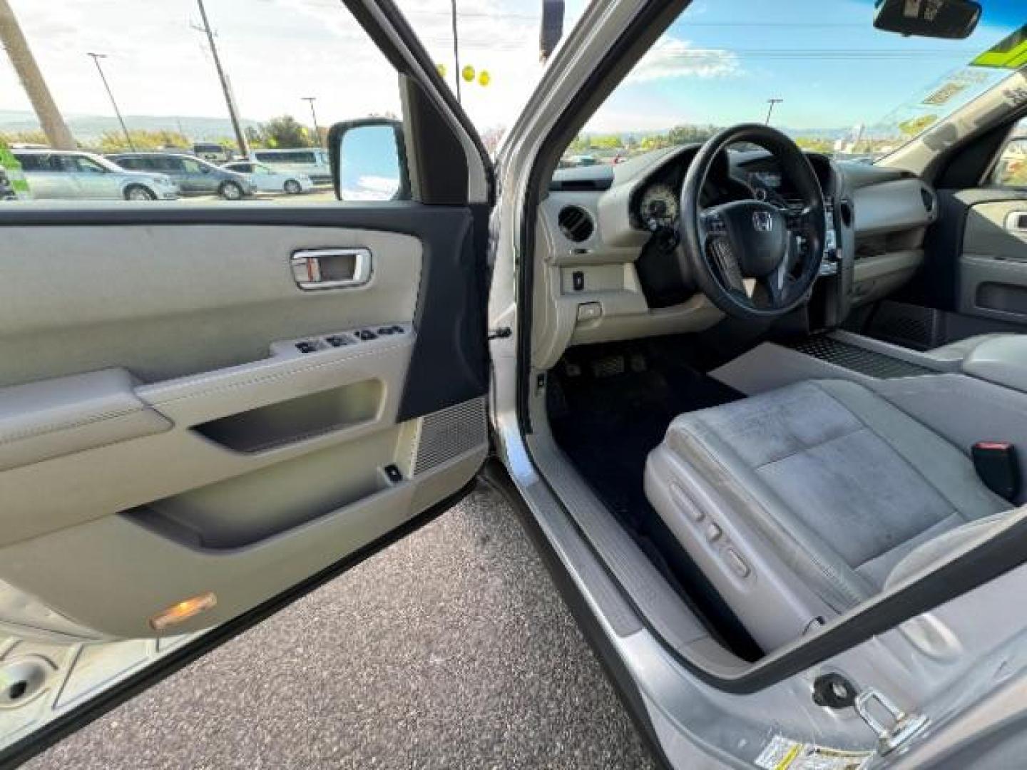 2012 Alabaster Silver Metallic /Gray Cloth Interior Honda Pilot EX 4WD 5-Spd AT (5FNYF4H40CB) with an 3.5L V6 SOHC 24V engine, 5-Speed Automatic transmission, located at 940 North Main Street, Cedar City, UT, 84720, (435) 628-0023, 37.692936, -113.061897 - We specialize in helping ALL people get the best financing available. No matter your credit score, good, bad or none we can get you an amazing rate. Had a bankruptcy, divorce, or repossessions? We give you the green light to get your credit back on the road. Low down and affordable payments that fit - Photo#15