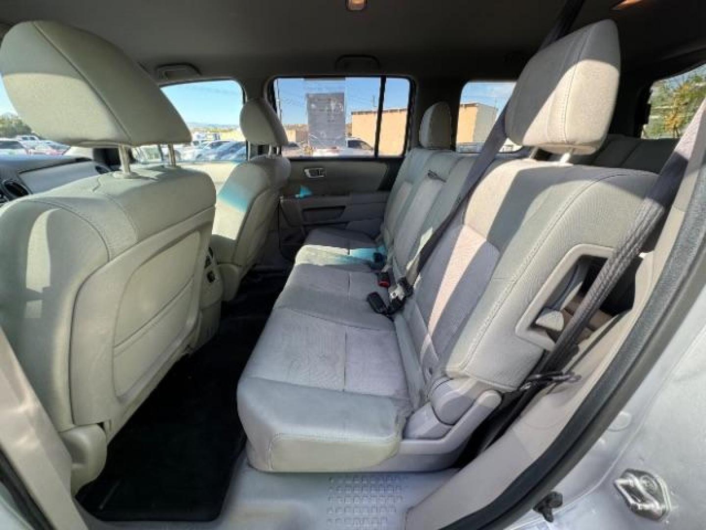 2012 Alabaster Silver Metallic /Gray Cloth Interior Honda Pilot EX 4WD 5-Spd AT (5FNYF4H40CB) with an 3.5L V6 SOHC 24V engine, 5-Speed Automatic transmission, located at 940 North Main Street, Cedar City, UT, 84720, (435) 628-0023, 37.692936, -113.061897 - We specialize in helping ALL people get the best financing available. No matter your credit score, good, bad or none we can get you an amazing rate. Had a bankruptcy, divorce, or repossessions? We give you the green light to get your credit back on the road. Low down and affordable payments that fit - Photo#26