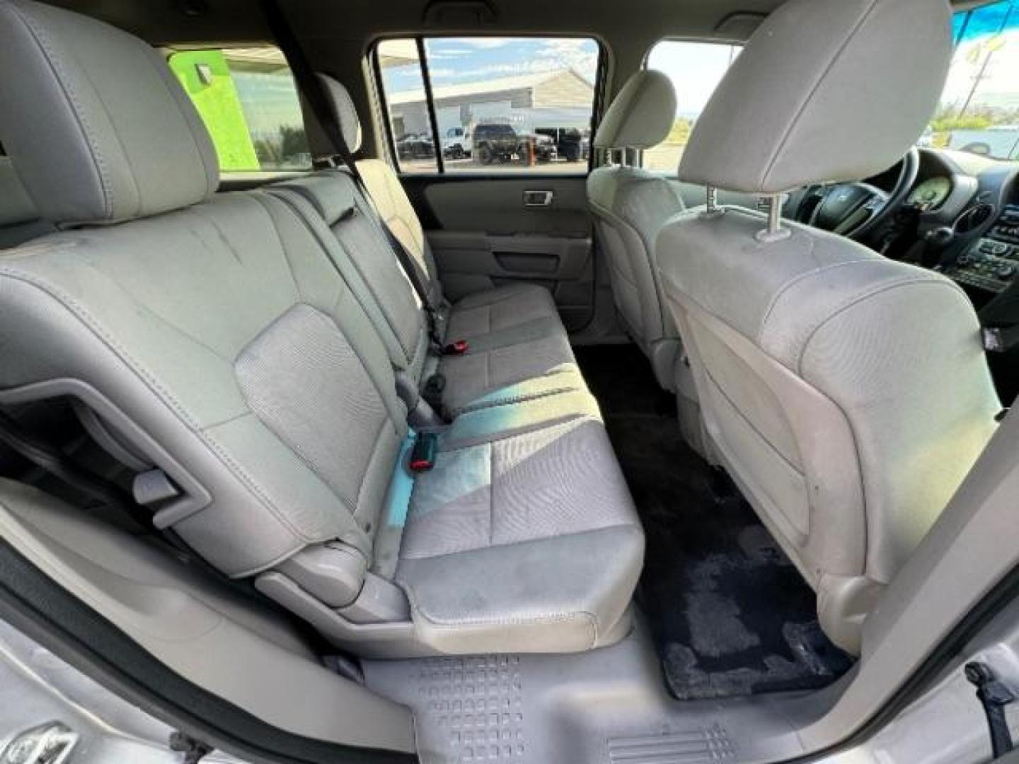 2012 Alabaster Silver Metallic /Gray Cloth Interior Honda Pilot EX 4WD 5-Spd AT (5FNYF4H40CB) with an 3.5L V6 SOHC 24V engine, 5-Speed Automatic transmission, located at 940 North Main Street, Cedar City, UT, 84720, (435) 628-0023, 37.692936, -113.061897 - We specialize in helping ALL people get the best financing available. No matter your credit score, good, bad or none we can get you an amazing rate. Had a bankruptcy, divorce, or repossessions? We give you the green light to get your credit back on the road. Low down and affordable payments that fit - Photo#35