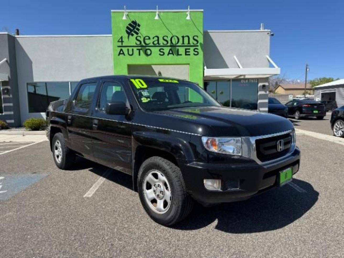 2010 Crystal Black Pearl /Beige Cloth Interior Honda Ridgeline RT (5FPYK1F23AB) with an 3.5L V6 SOHC 24V engine, 5-Speed Automatic transmission, located at 1865 East Red Hills Pkwy, St. George, 84770, (435) 628-0023, 37.120850, -113.543640 - Photo#0