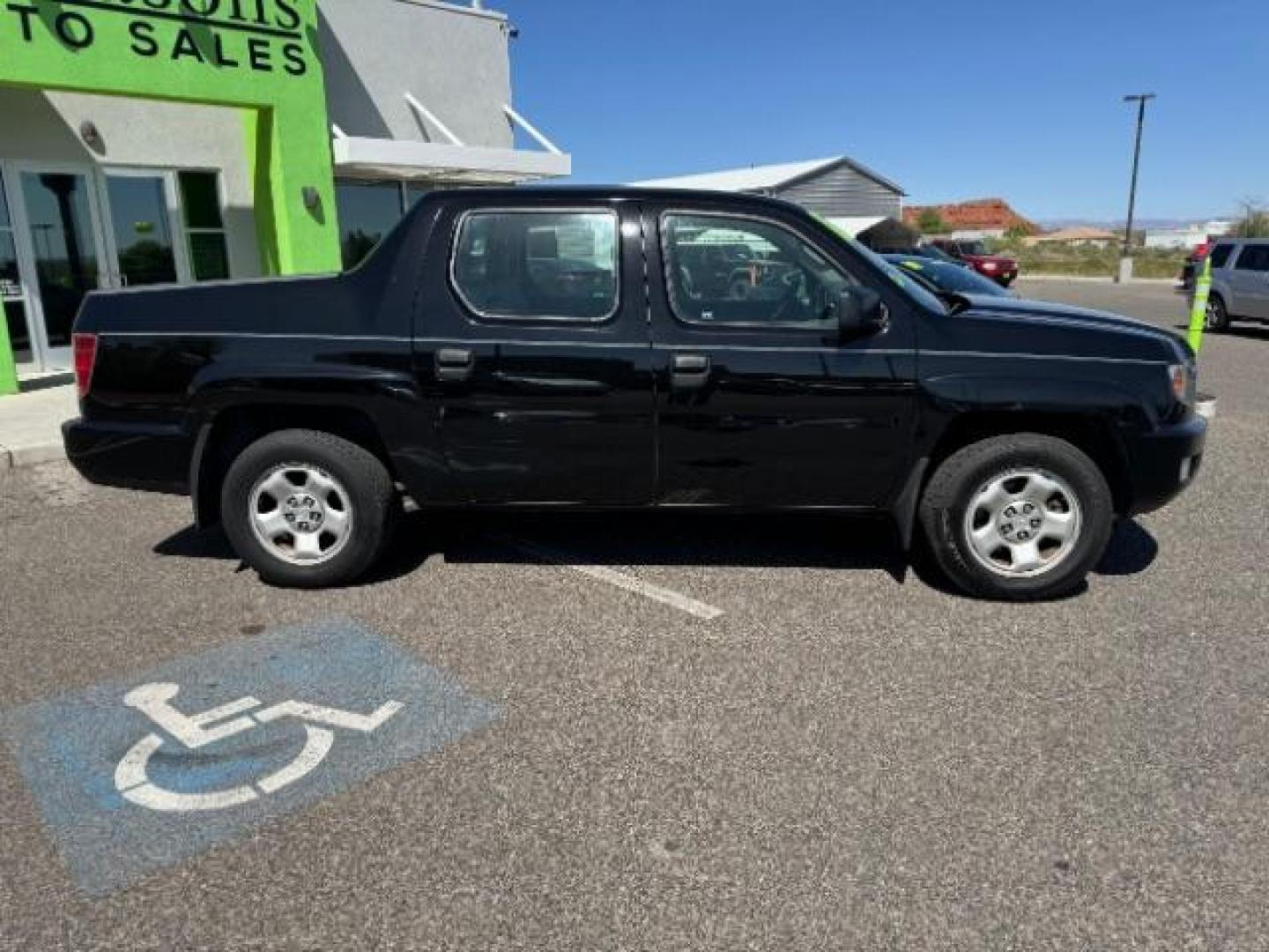 2010 Crystal Black Pearl /Beige Cloth Interior Honda Ridgeline RT (5FPYK1F23AB) with an 3.5L V6 SOHC 24V engine, 5-Speed Automatic transmission, located at 1865 East Red Hills Pkwy, St. George, 84770, (435) 628-0023, 37.120850, -113.543640 - Photo#11