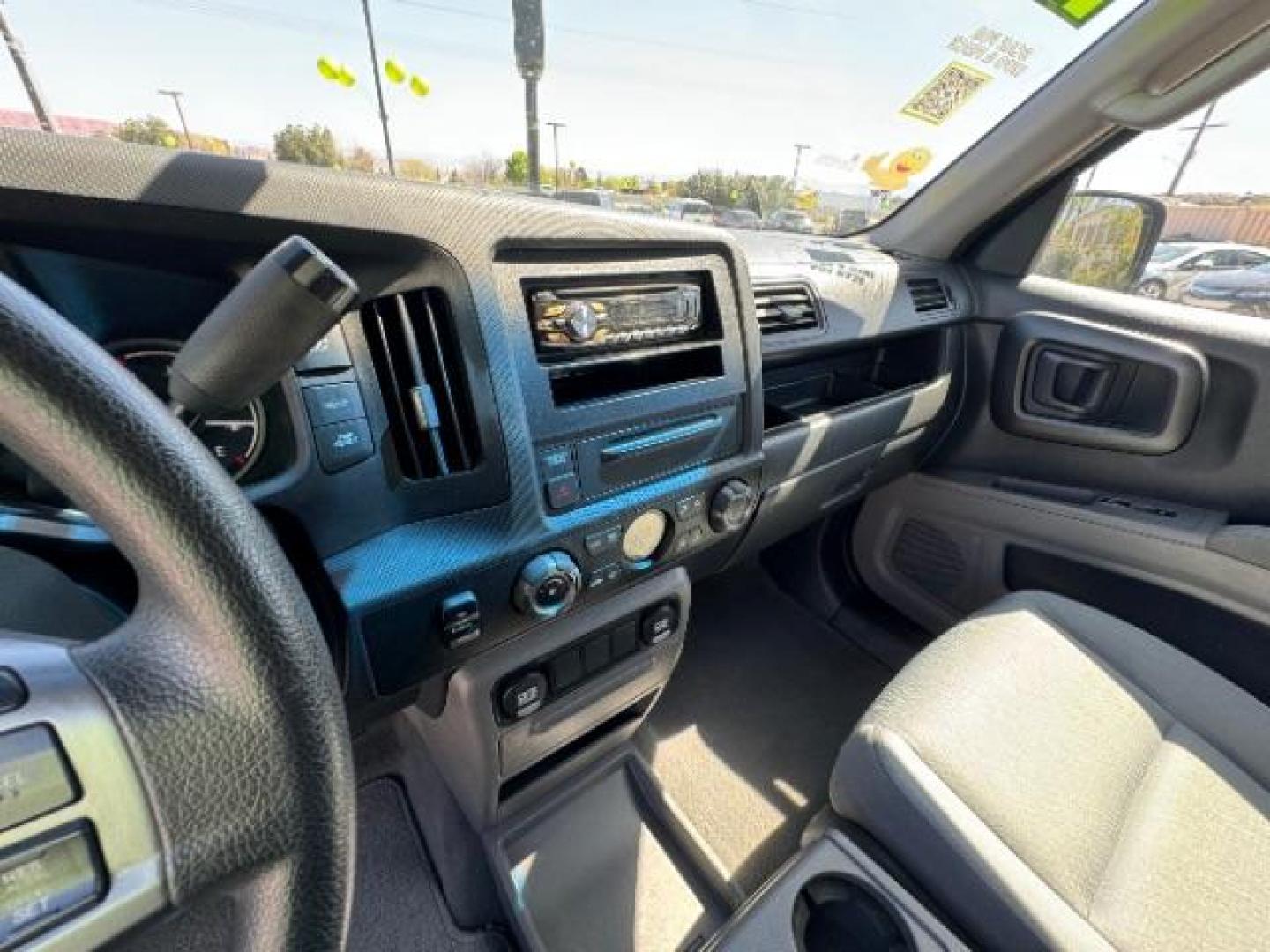 2010 Crystal Black Pearl /Beige Cloth Interior Honda Ridgeline RT (5FPYK1F23AB) with an 3.5L V6 SOHC 24V engine, 5-Speed Automatic transmission, located at 1865 East Red Hills Pkwy, St. George, 84770, (435) 628-0023, 37.120850, -113.543640 - Photo#18