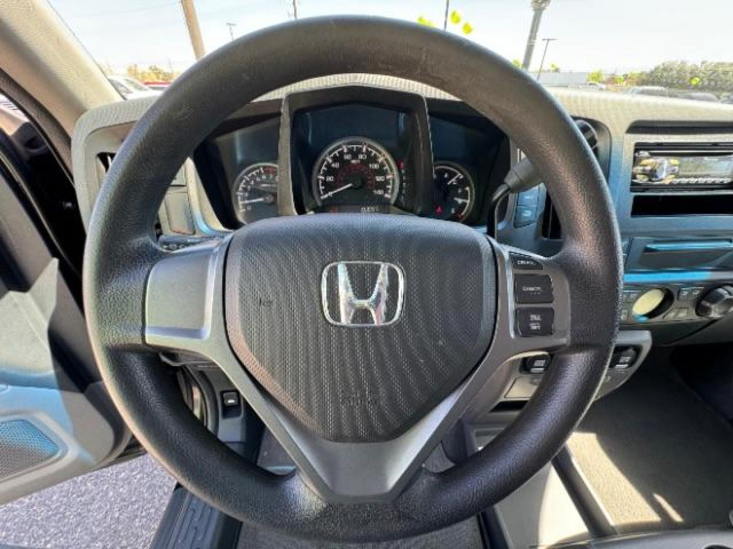 2010 Crystal Black Pearl /Beige Cloth Interior Honda Ridgeline RT (5FPYK1F23AB) with an 3.5L V6 SOHC 24V engine, 5-Speed Automatic transmission, located at 1865 East Red Hills Pkwy, St. George, 84770, (435) 628-0023, 37.120850, -113.543640 - Photo#19