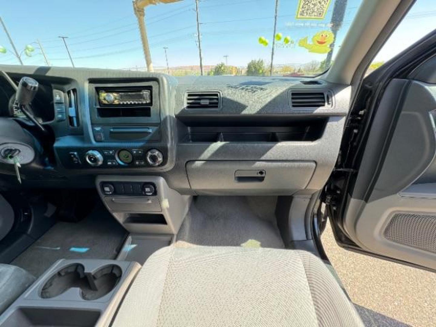 2010 Crystal Black Pearl /Beige Cloth Interior Honda Ridgeline RT (5FPYK1F23AB) with an 3.5L V6 SOHC 24V engine, 5-Speed Automatic transmission, located at 1865 East Red Hills Pkwy, St. George, 84770, (435) 628-0023, 37.120850, -113.543640 - Photo#33