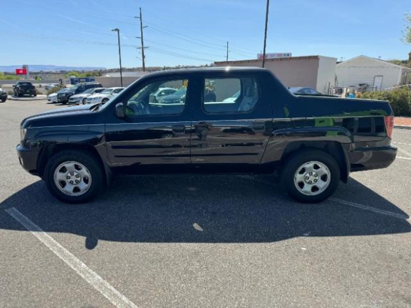 2010 Crystal Black Pearl /Beige Cloth Interior Honda Ridgeline RT (5FPYK1F23AB) with an 3.5L V6 SOHC 24V engine, 5-Speed Automatic transmission, located at 1865 East Red Hills Pkwy, St. George, 84770, (435) 628-0023, 37.120850, -113.543640 - Photo#5