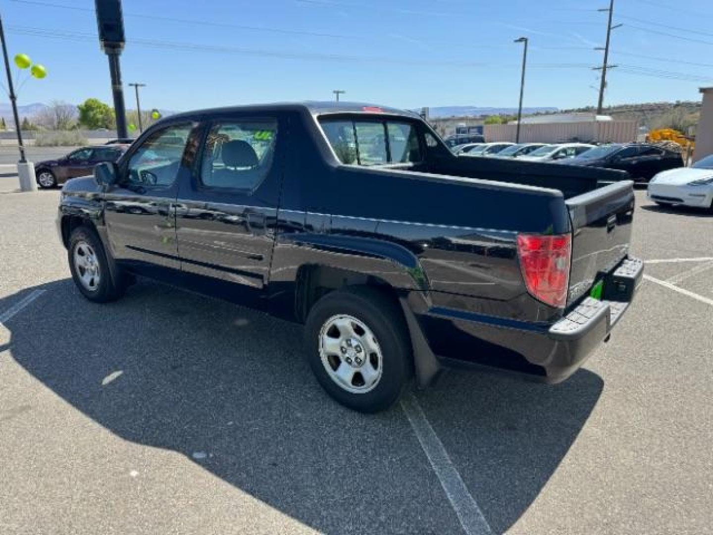 2010 Crystal Black Pearl /Beige Cloth Interior Honda Ridgeline RT (5FPYK1F23AB) with an 3.5L V6 SOHC 24V engine, 5-Speed Automatic transmission, located at 1865 East Red Hills Pkwy, St. George, 84770, (435) 628-0023, 37.120850, -113.543640 - Photo#6