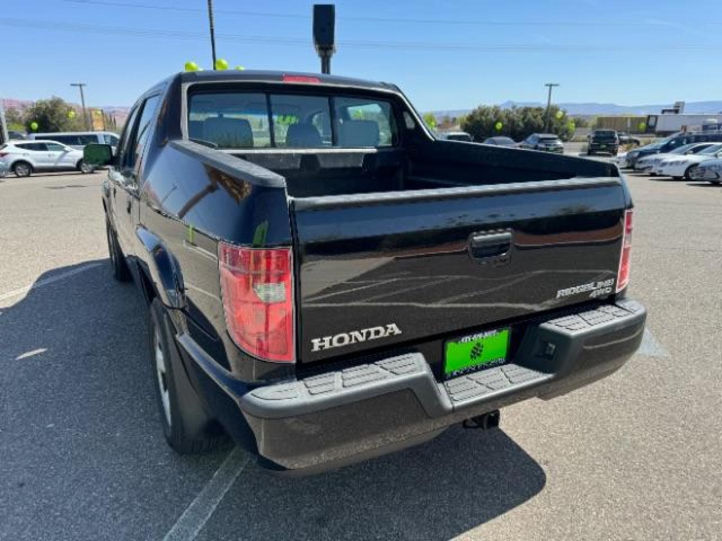 2010 Crystal Black Pearl /Beige Cloth Interior Honda Ridgeline RT (5FPYK1F23AB) with an 3.5L V6 SOHC 24V engine, 5-Speed Automatic transmission, located at 1865 East Red Hills Pkwy, St. George, 84770, (435) 628-0023, 37.120850, -113.543640 - Photo#7