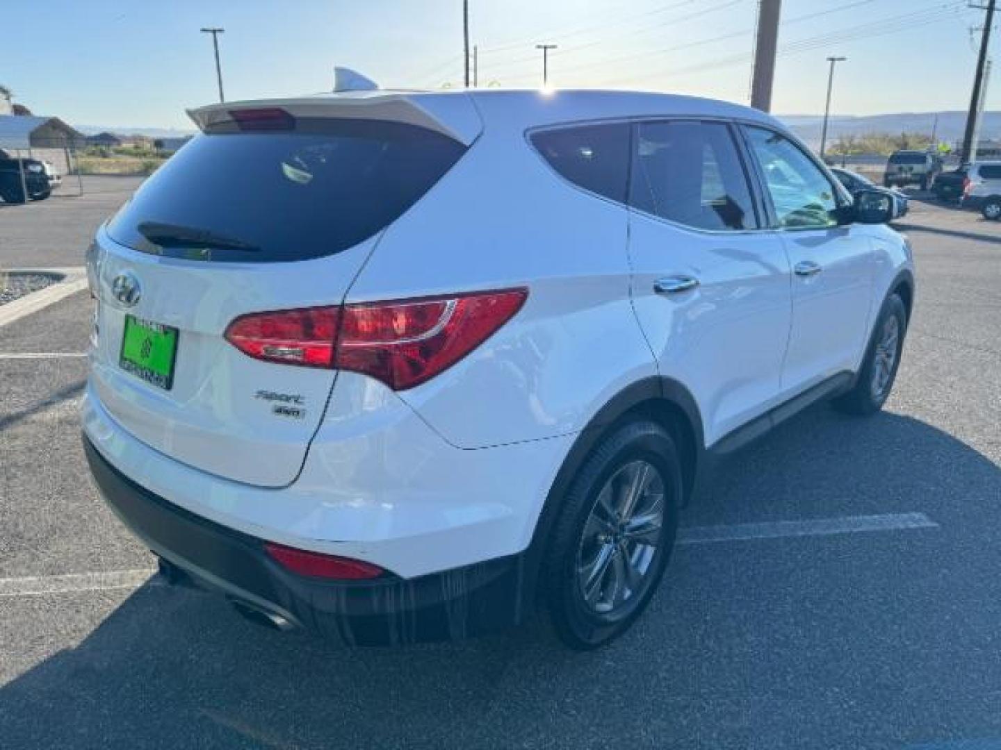 2016 Frost White Pearl /Gray, cloth Hyundai Santa Fe Sport 2.4 AWD (5XYZTDLB2GG) with an 2.4L L4 DOHC 16V engine, 6-Speed Automatic transmission, located at 940 North Main Street, Cedar City, UT, 84720, (435) 628-0023, 37.692936, -113.061897 - Photo#9